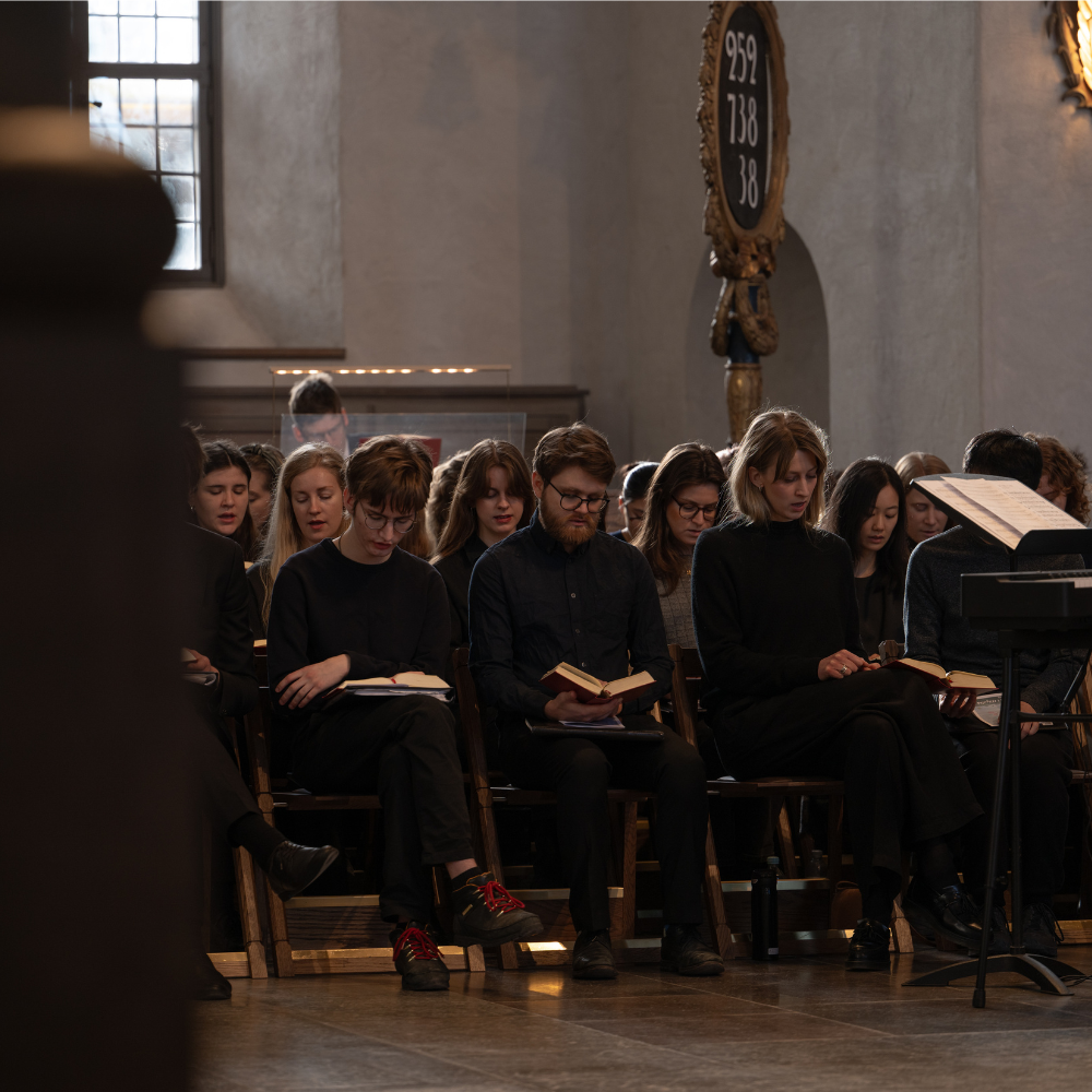 Choir resting before a Sunday service at Högalidskyrkan in Stockholm