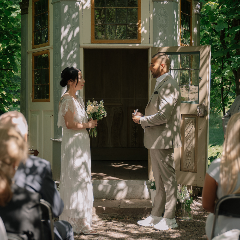 Bride and groom during an outdoor wedding ceremony in Sweden