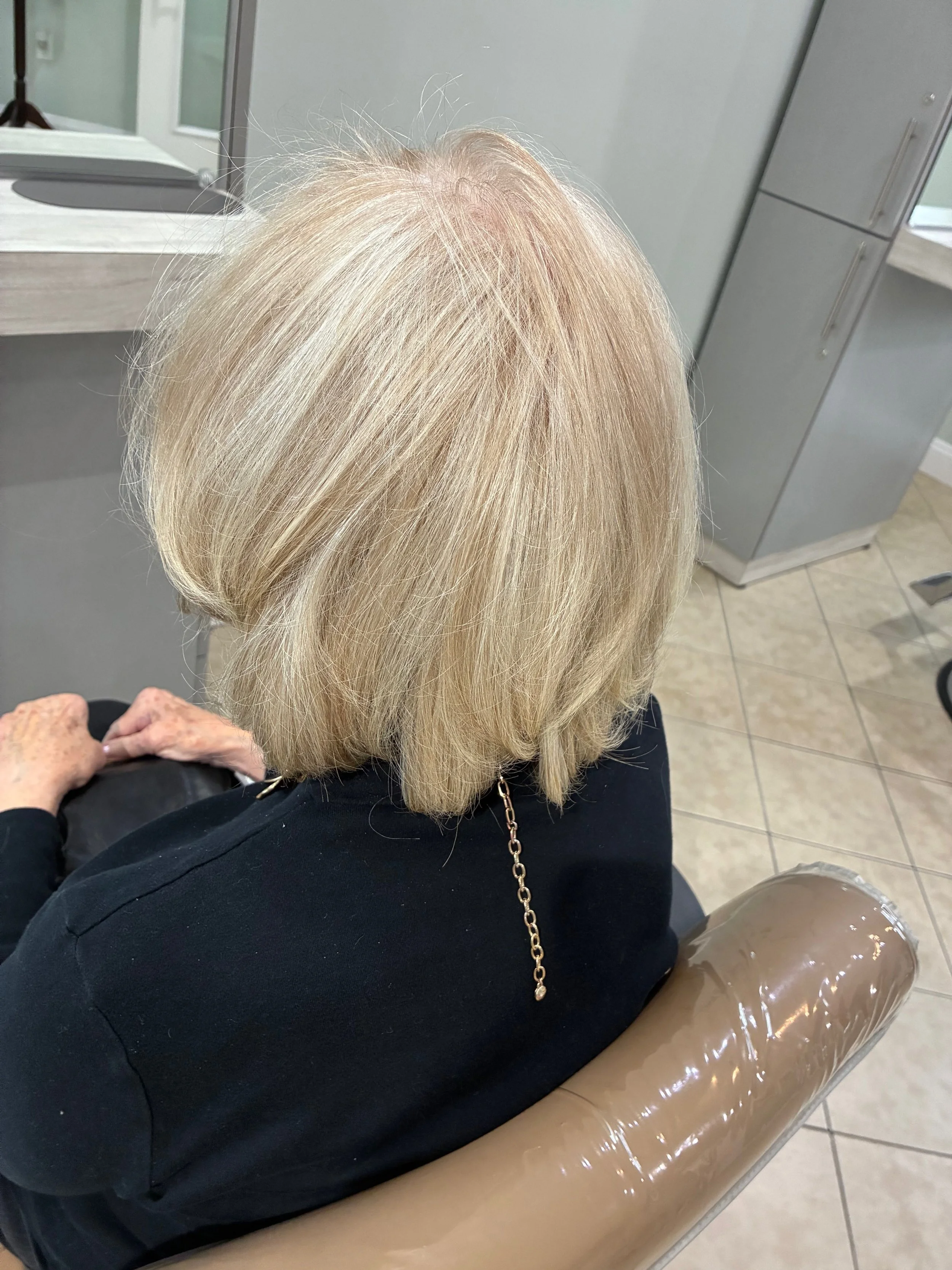 Highlights blending with natural gray hair