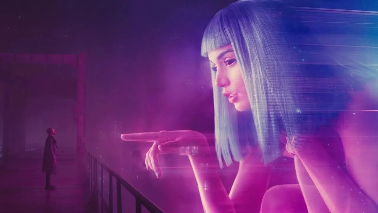 A giant holographic woman with purple hair and makeup looks at a small person on a balcony, both surrounded by a purple glowing mist.