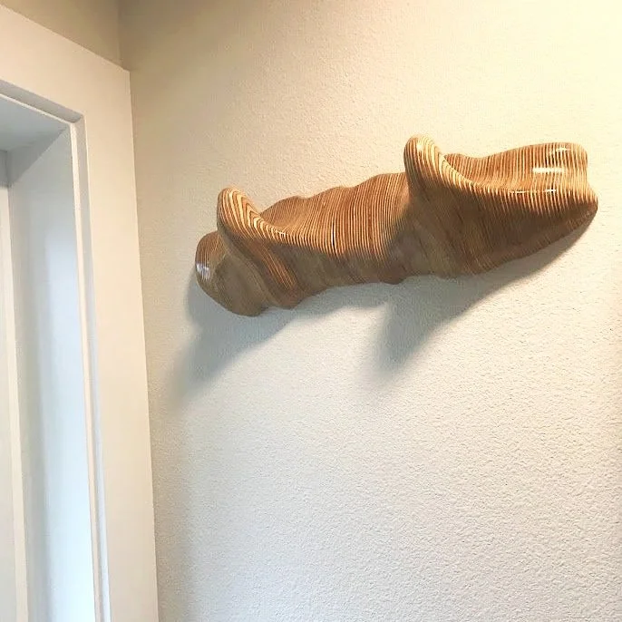 Organic carved hangers.