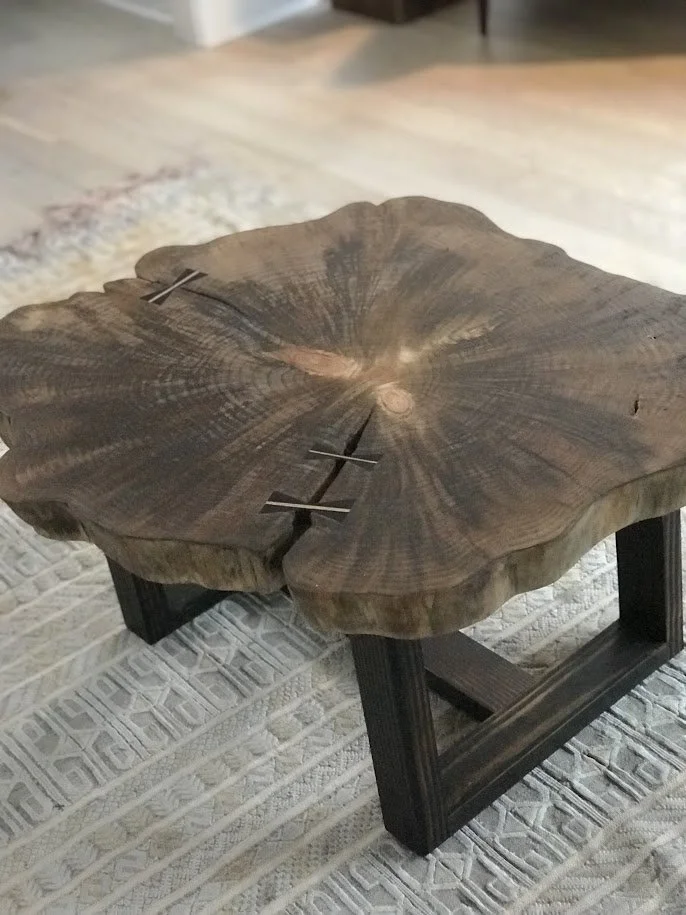 Live edge table round with inlays.