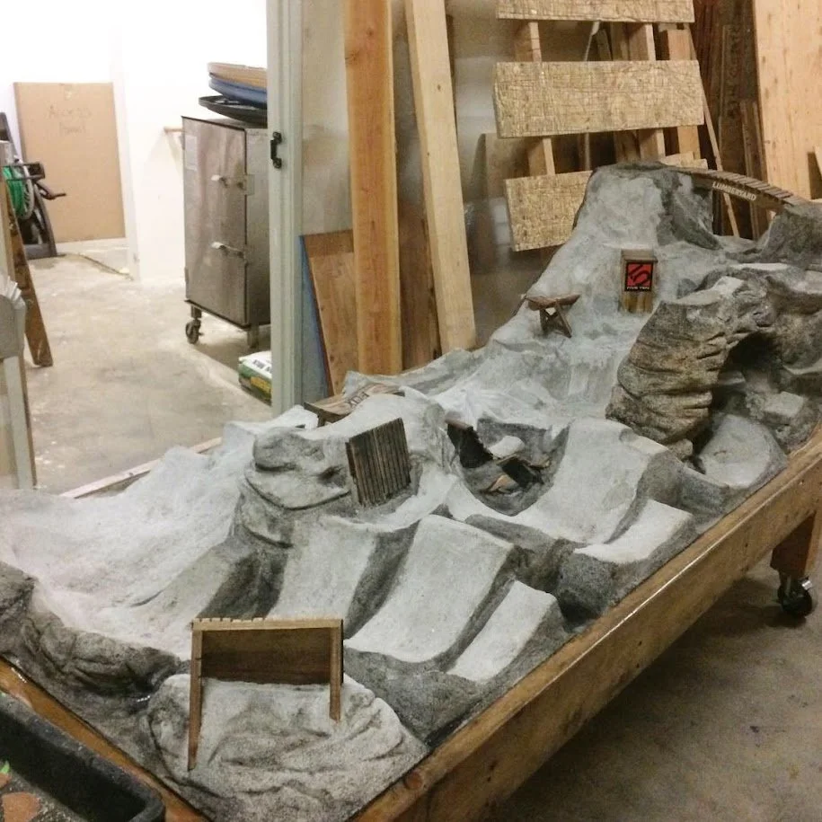 Concrete sculpted finger bike table.