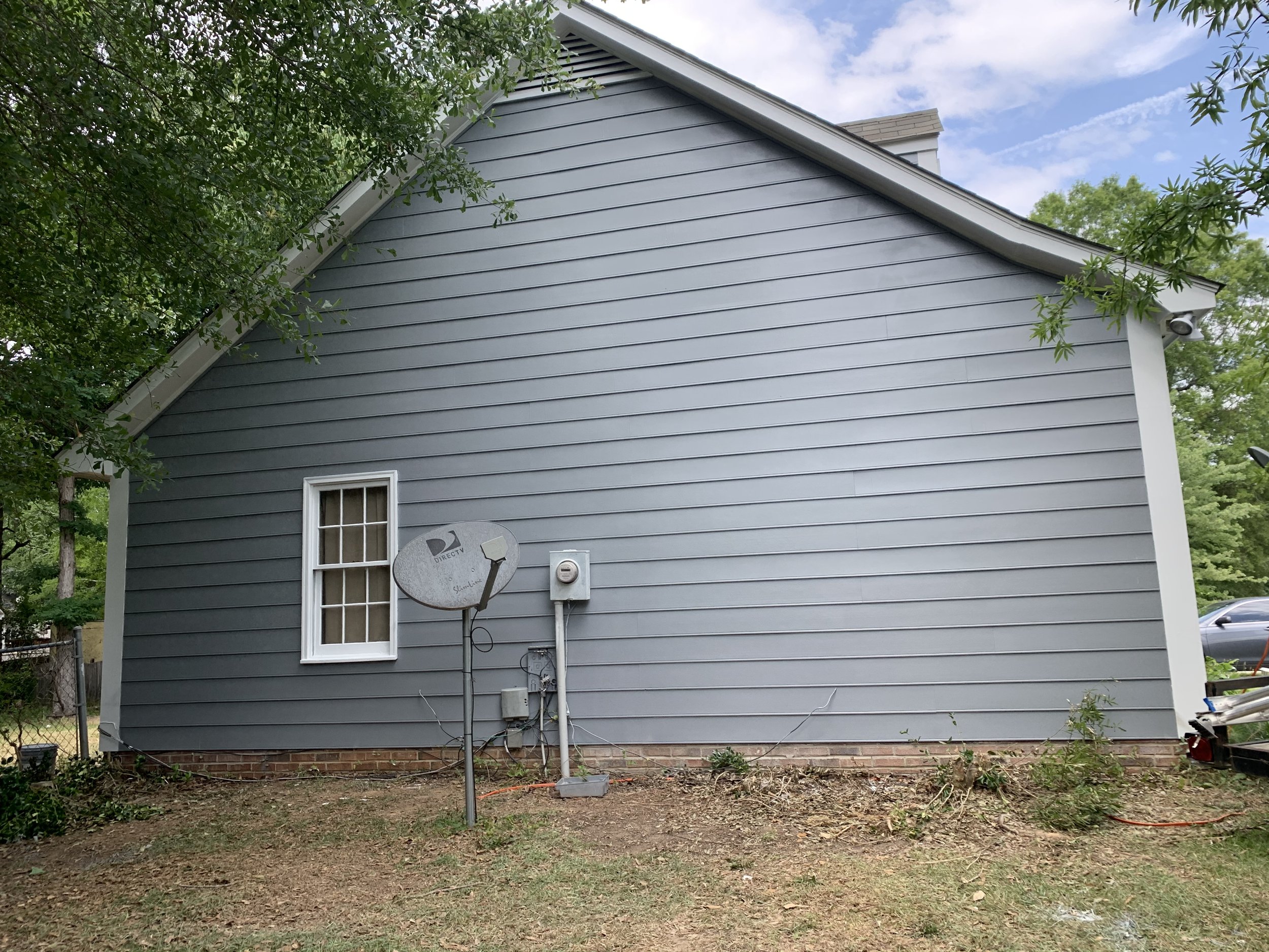composite siding replacement after photo
