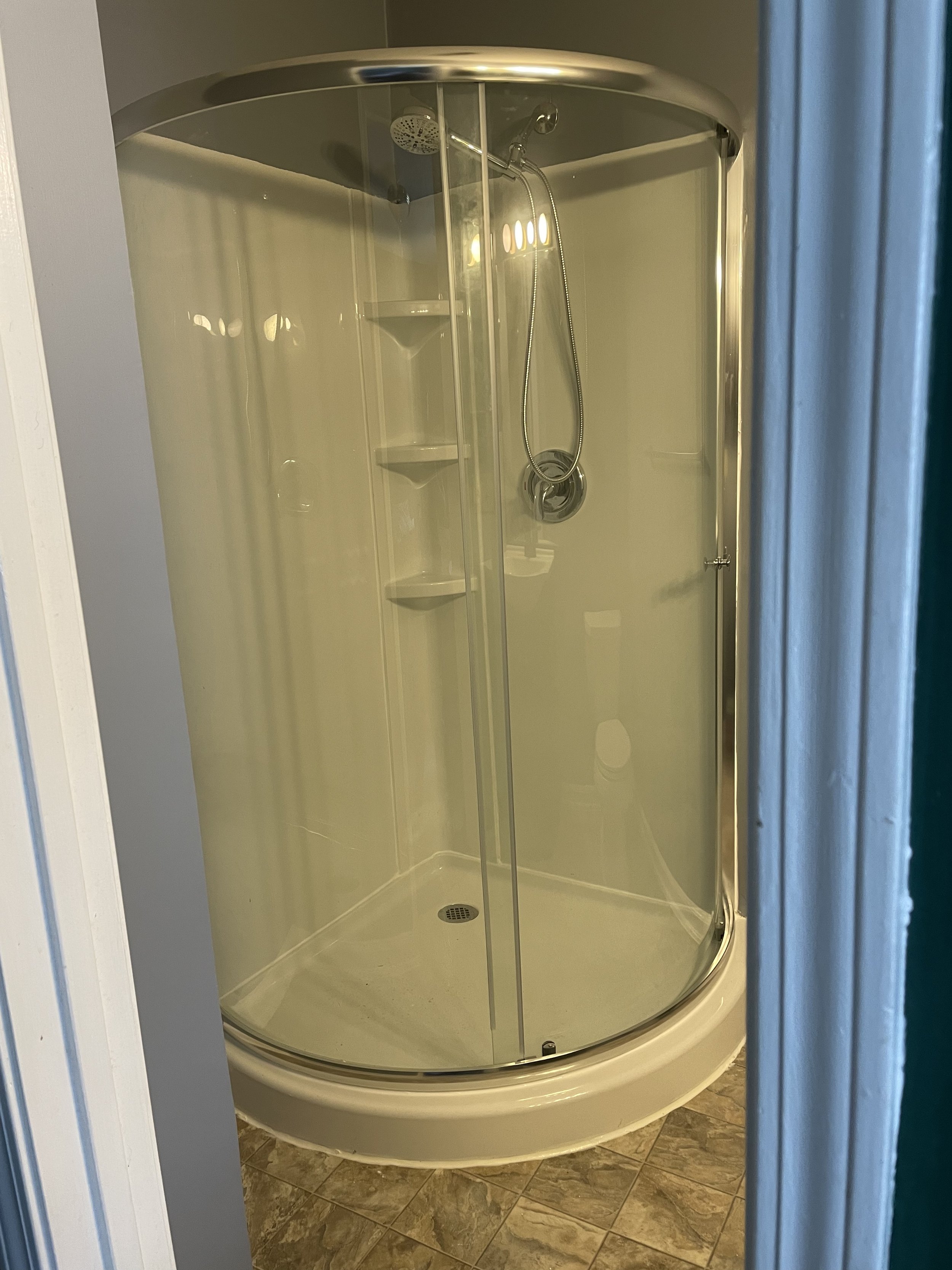 after photo of stand up shower install and floor