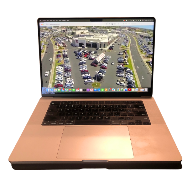 Computer laptop opened to show an auto dealership as viewed from a mobile camera trailer