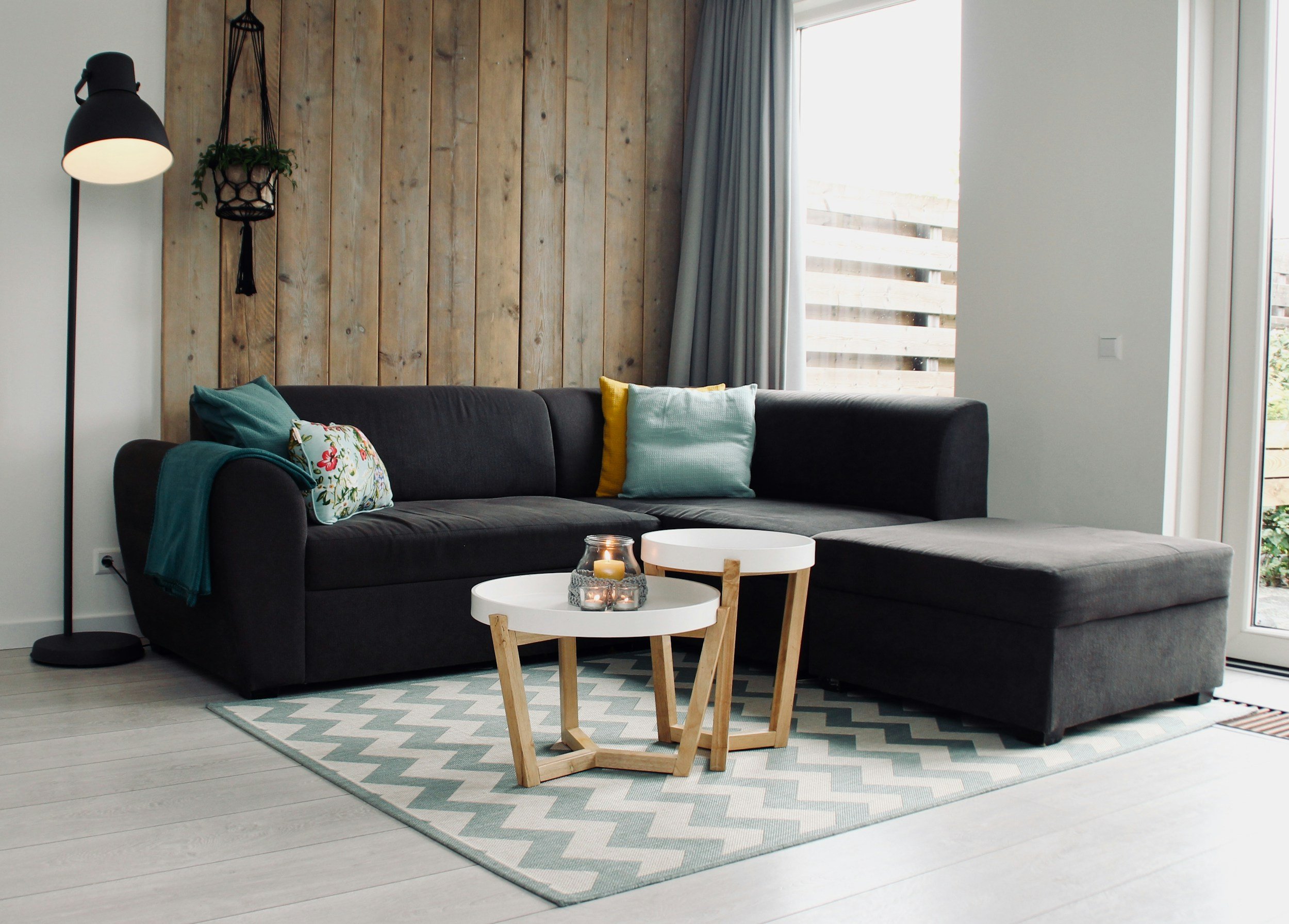 Corner set up of couch and coffee table on rug