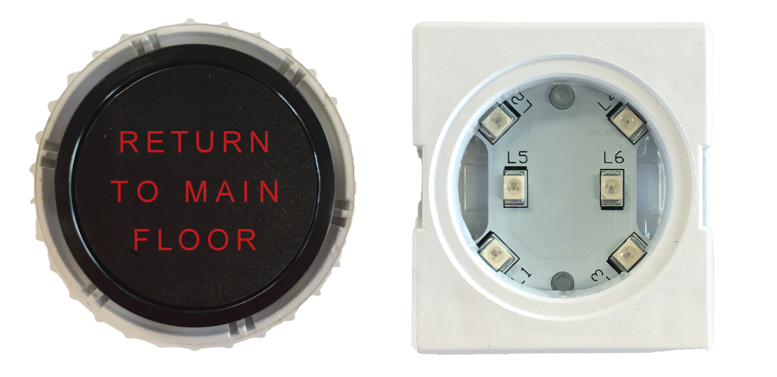 A black circular button with red text saying 'Return to Main Floor' and a white electrical outlet socket with LED lights labeled for different connections.