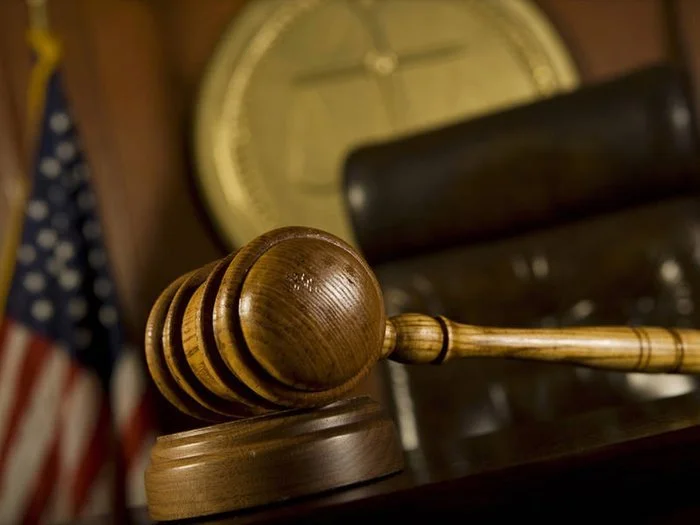 Gavel on table in courtroom