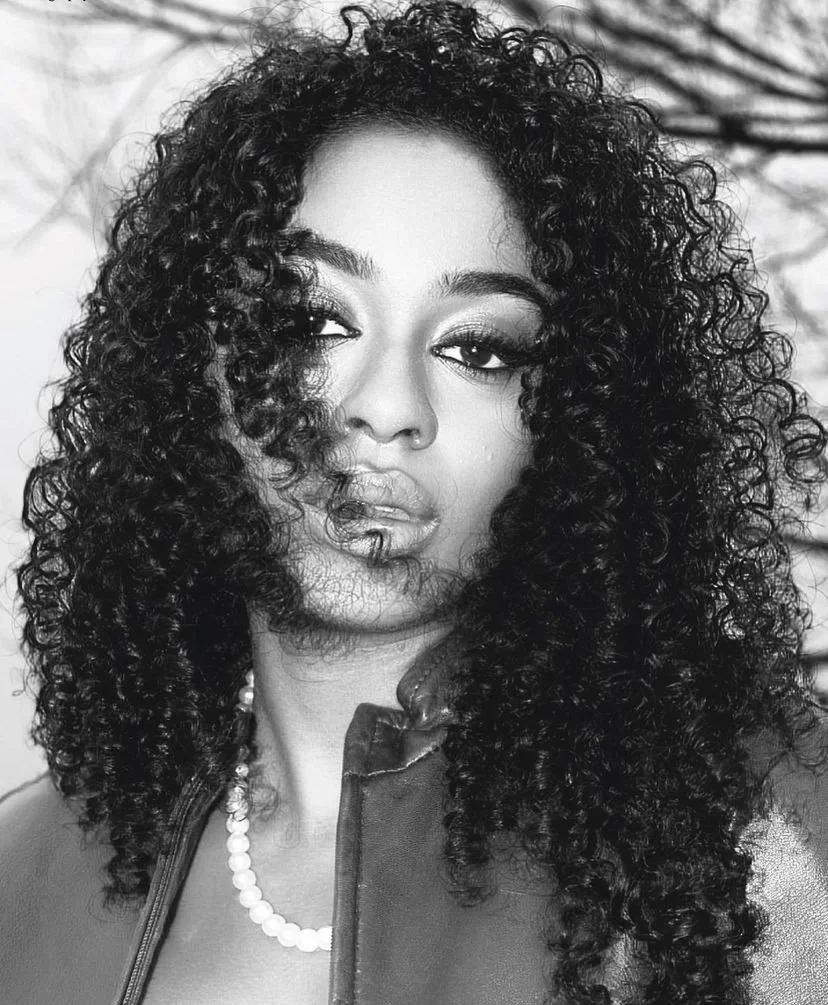 Canadian actress, Amanda Whyte posing for a black and white magazine shoot.