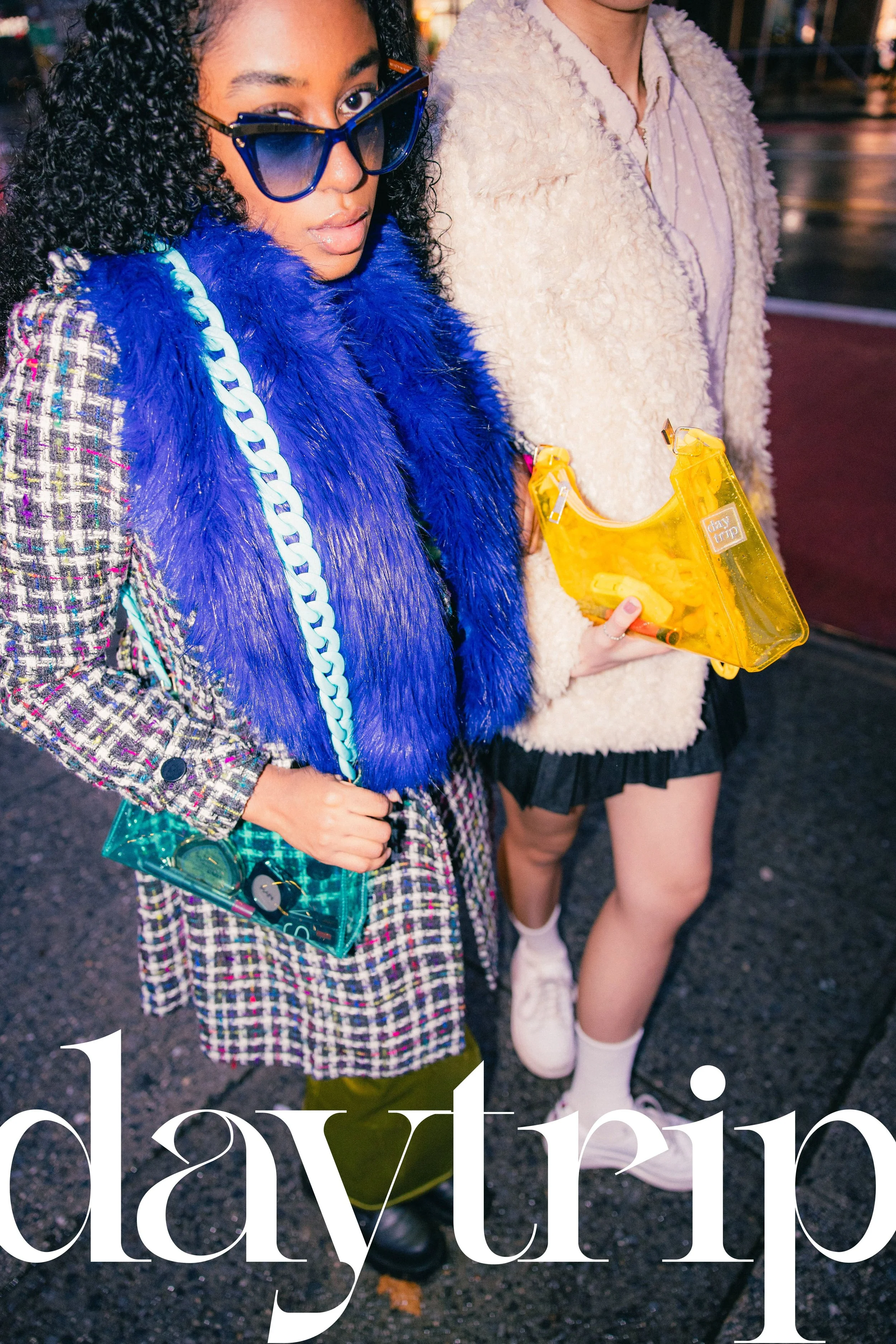 Model Amanda Whyte wearing contemporary streetwear for a purse brand.
