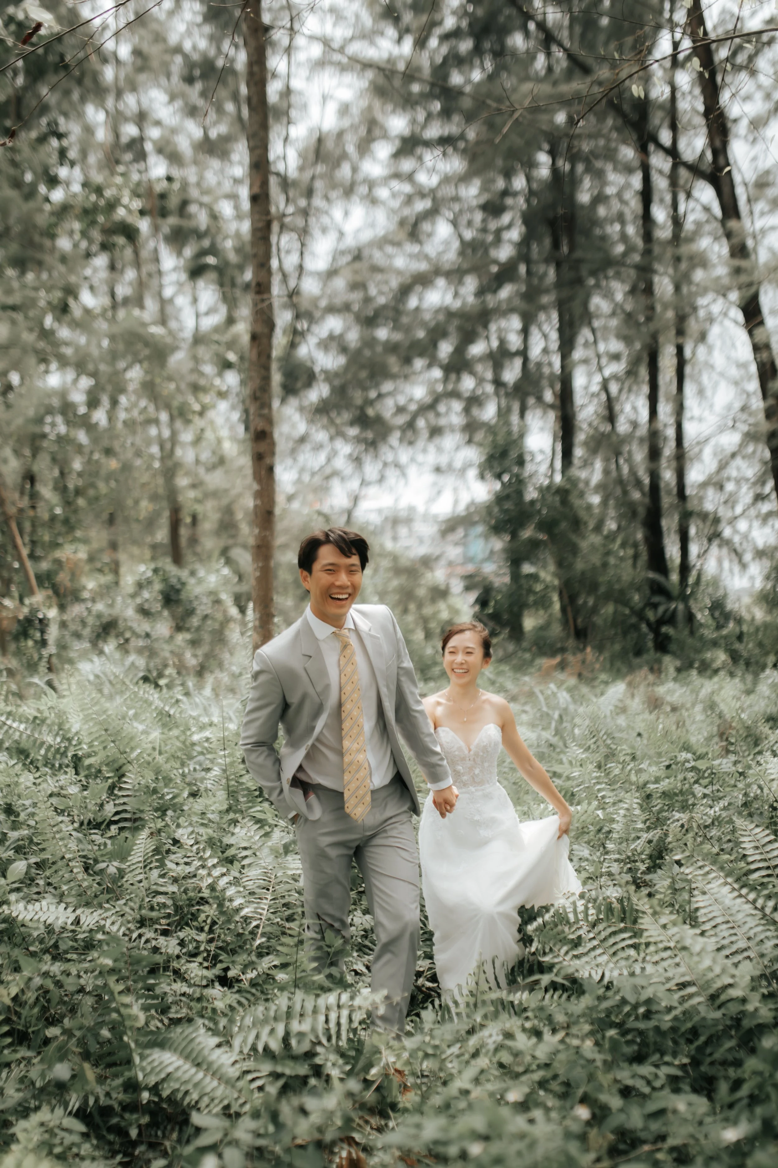 Relaxed and natural outdoor pre-wedding photoshoot at Coney Island Singapore, captured by Arielle for Breadandbutterworks.