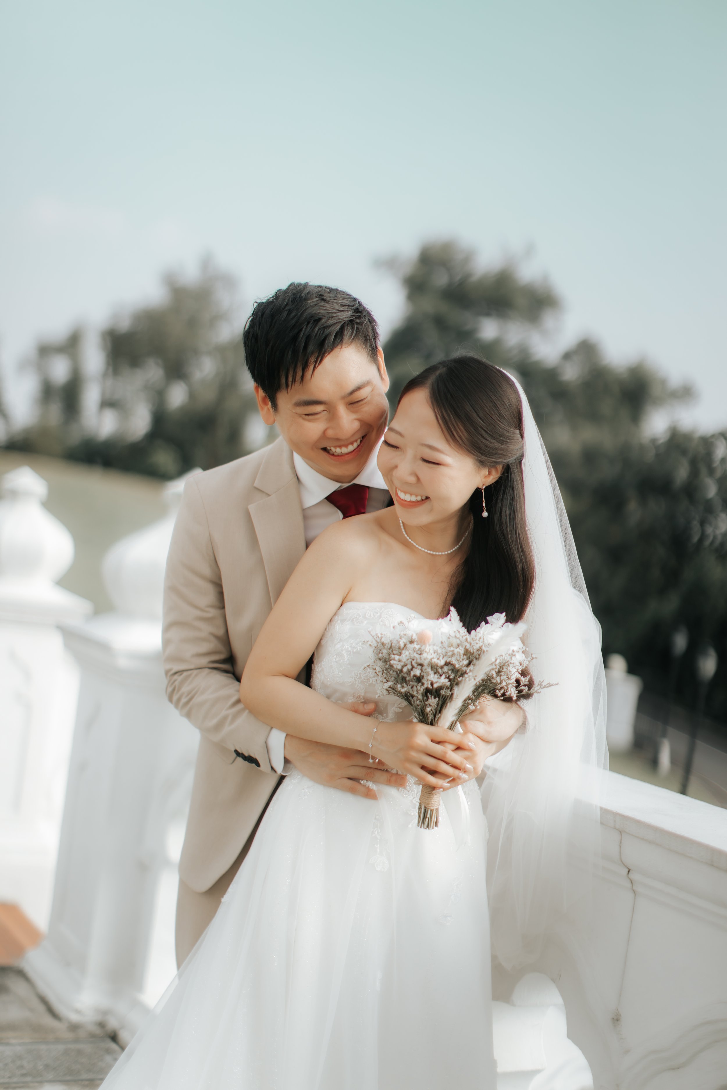 Light and airy pre-wedding photoshoot of a couple at Bandstand and Gallop Extension in Singapore. Captured by Arielle from Breadandbutterworks.