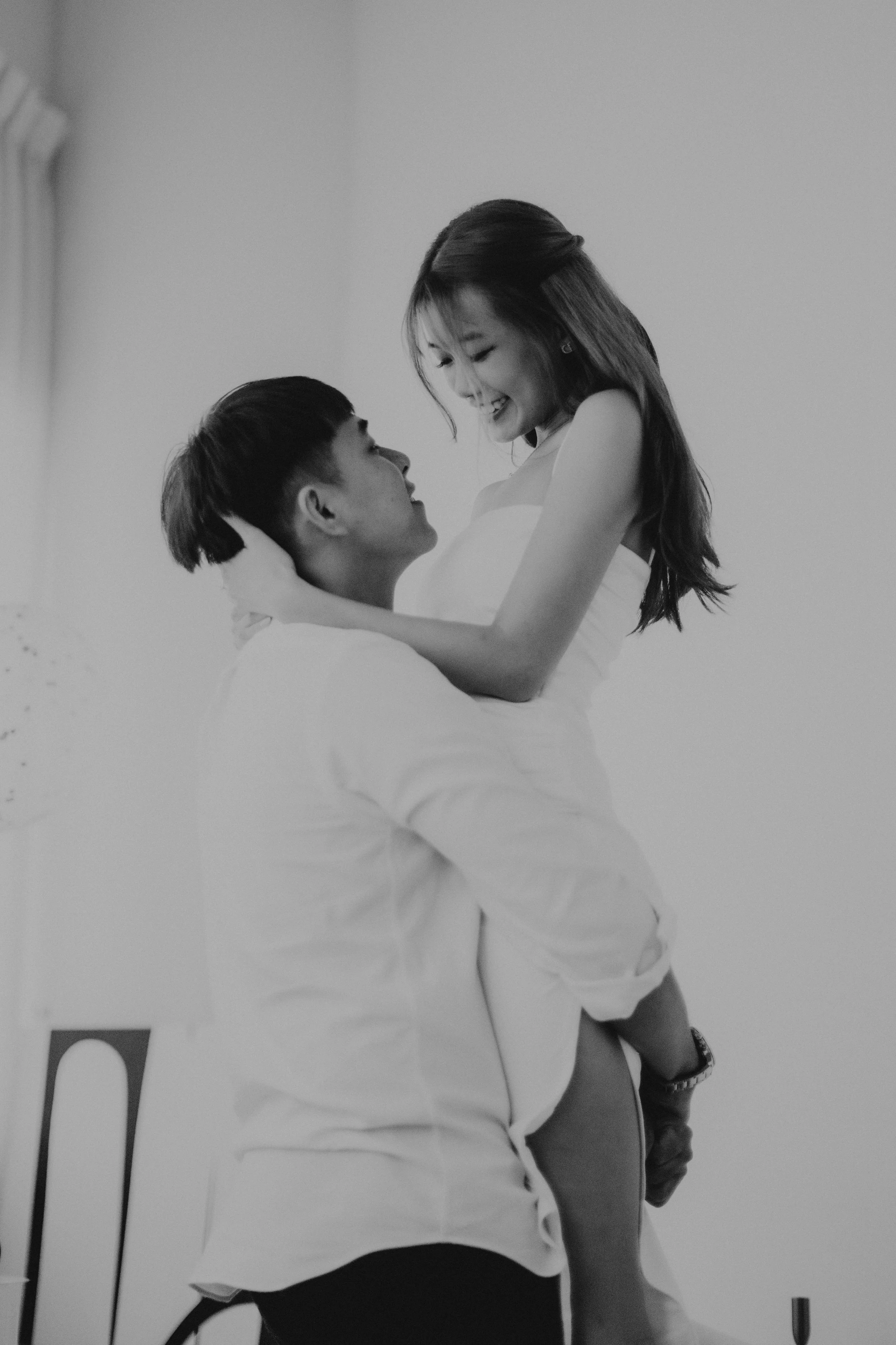 Romantic black and white surprise proposal photoshoot at Headspace Studios, captured by Ash for Breadandbutterworks in a light, airy and heartfelt style.