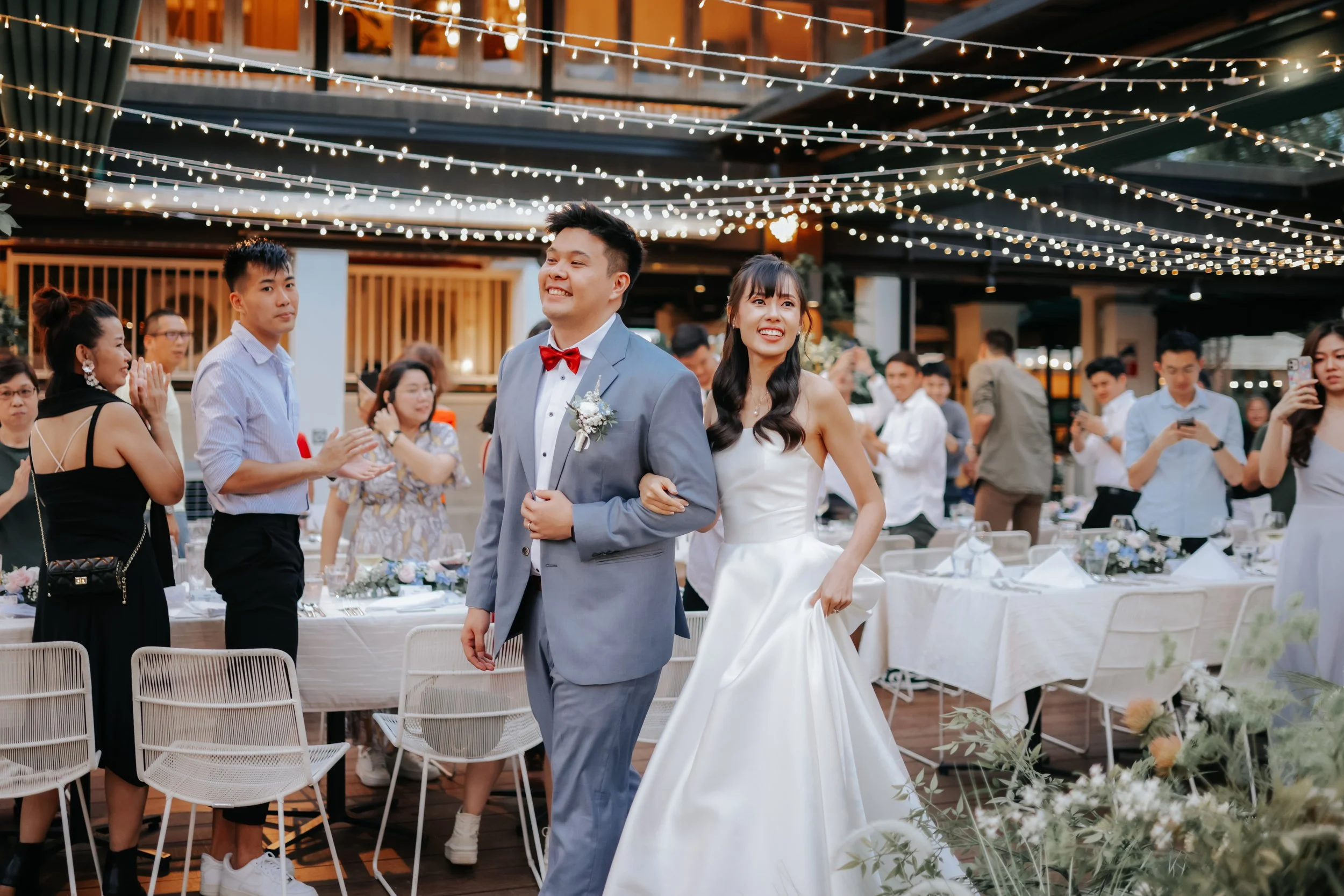 Light and airy actual day wedding photoshoot at Wheeler's Estate and East Coast Park in Singapore. Captured by Ash for Breadandbutterworks. 