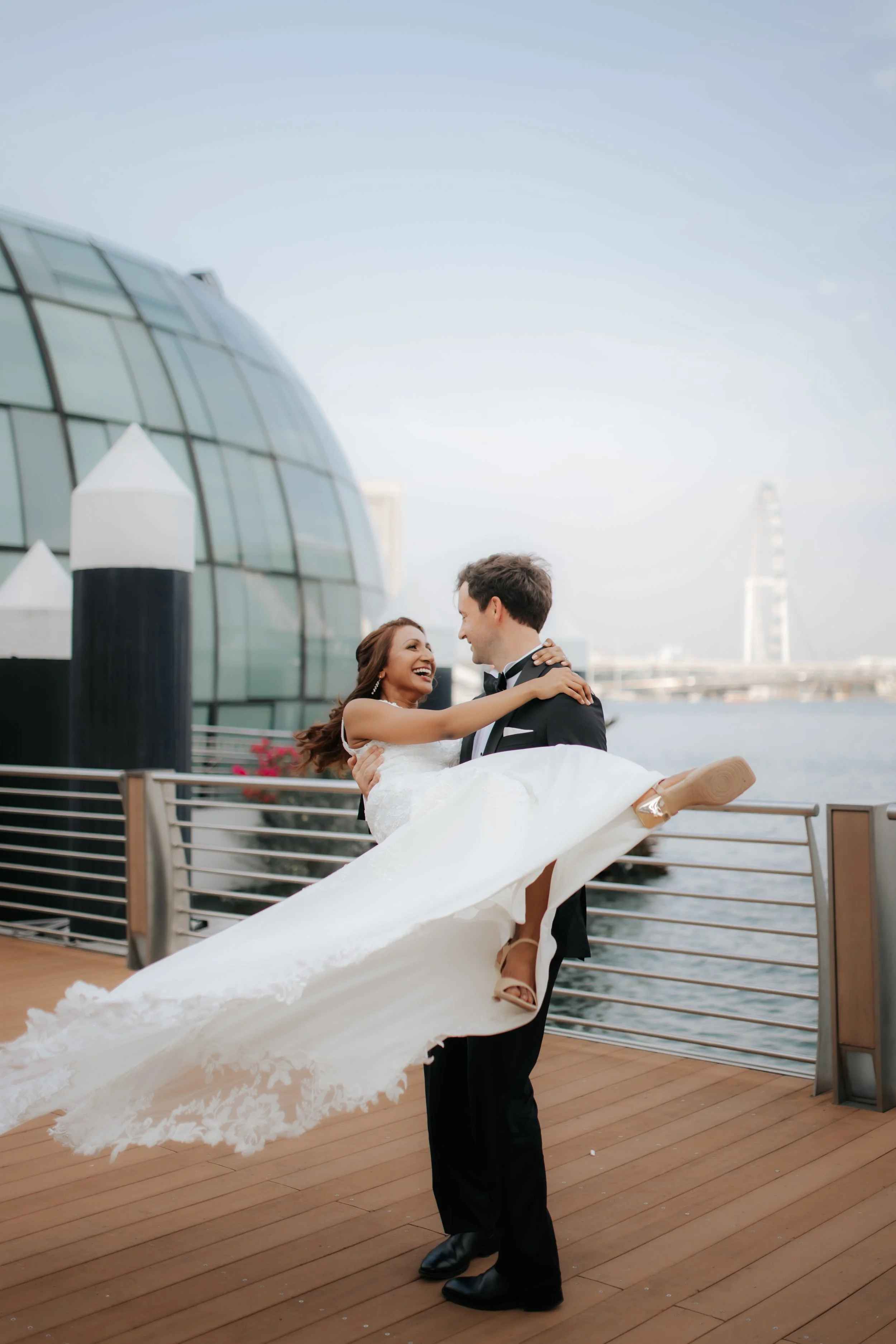 Light and airy actual day wedding photoshoot of the couple posing at Riviera, captured by Ash for Breadandbutterworks.