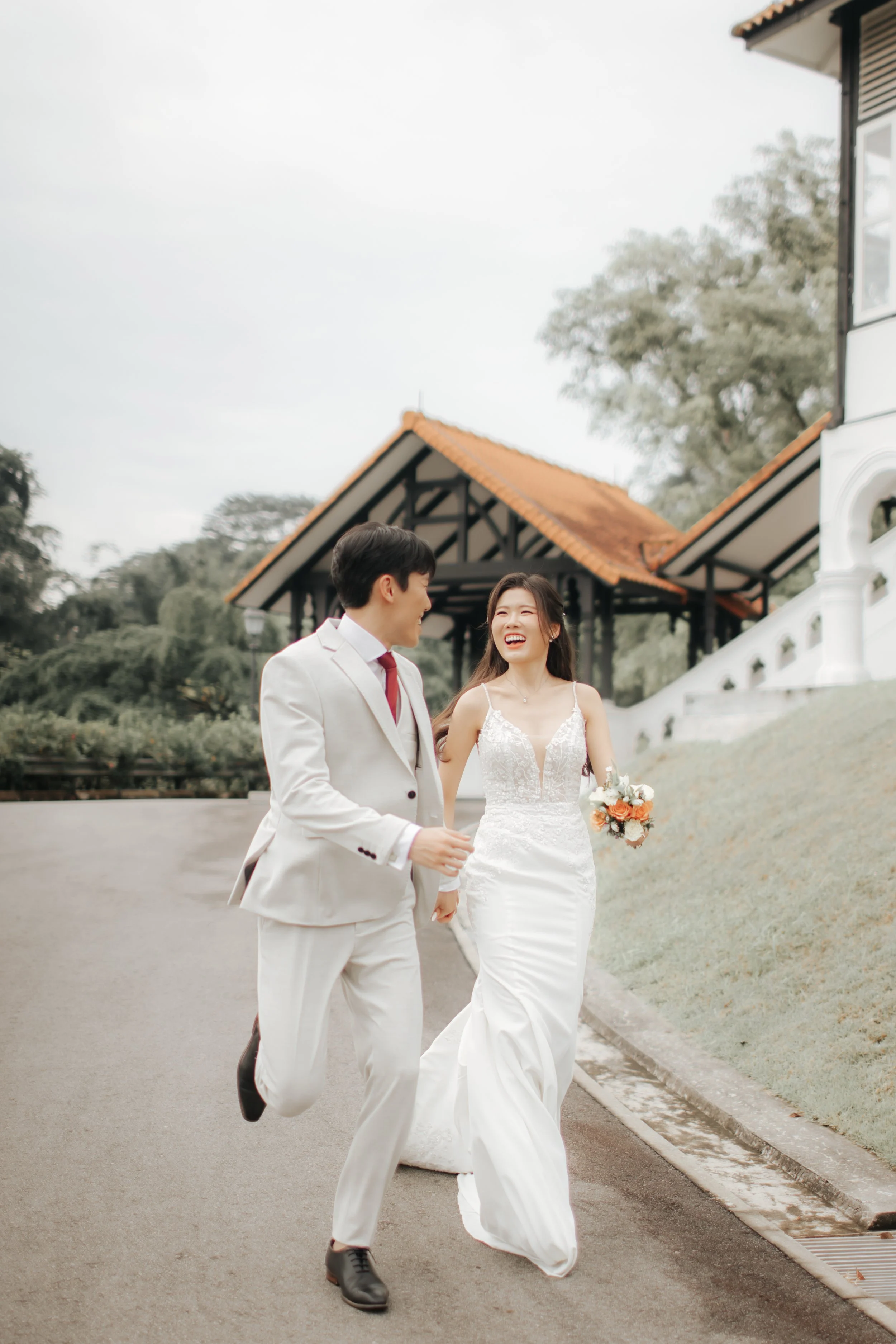 Light and airy pre-wedding photoshoot of a cheerful colour at Gallop Extension Singapore, captured by Arielle for Breadandbutterworks.