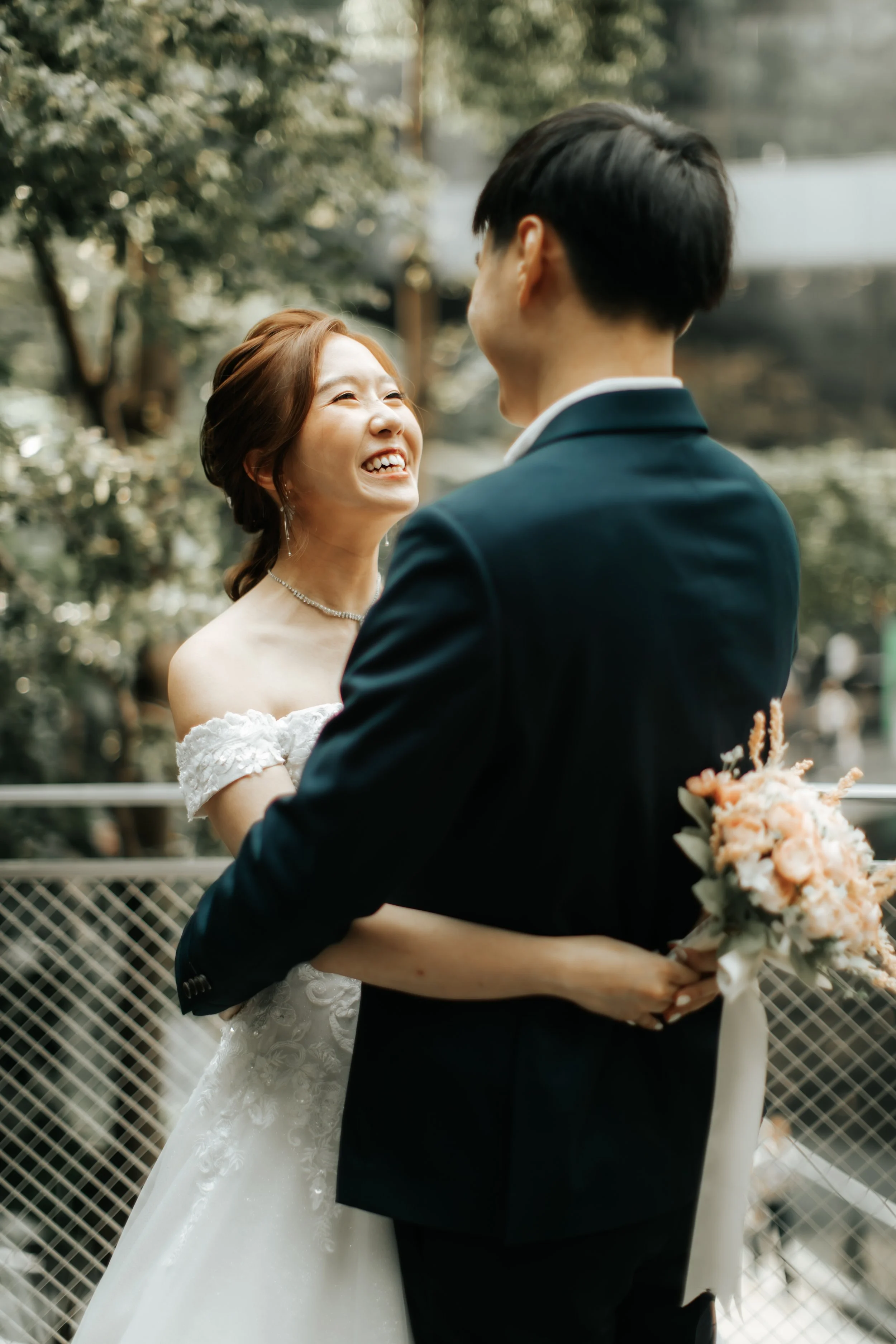 Light and romantic pre-wedding photoshoot at Changi Jewel, captured by Arielle for Breadandbutterworks.