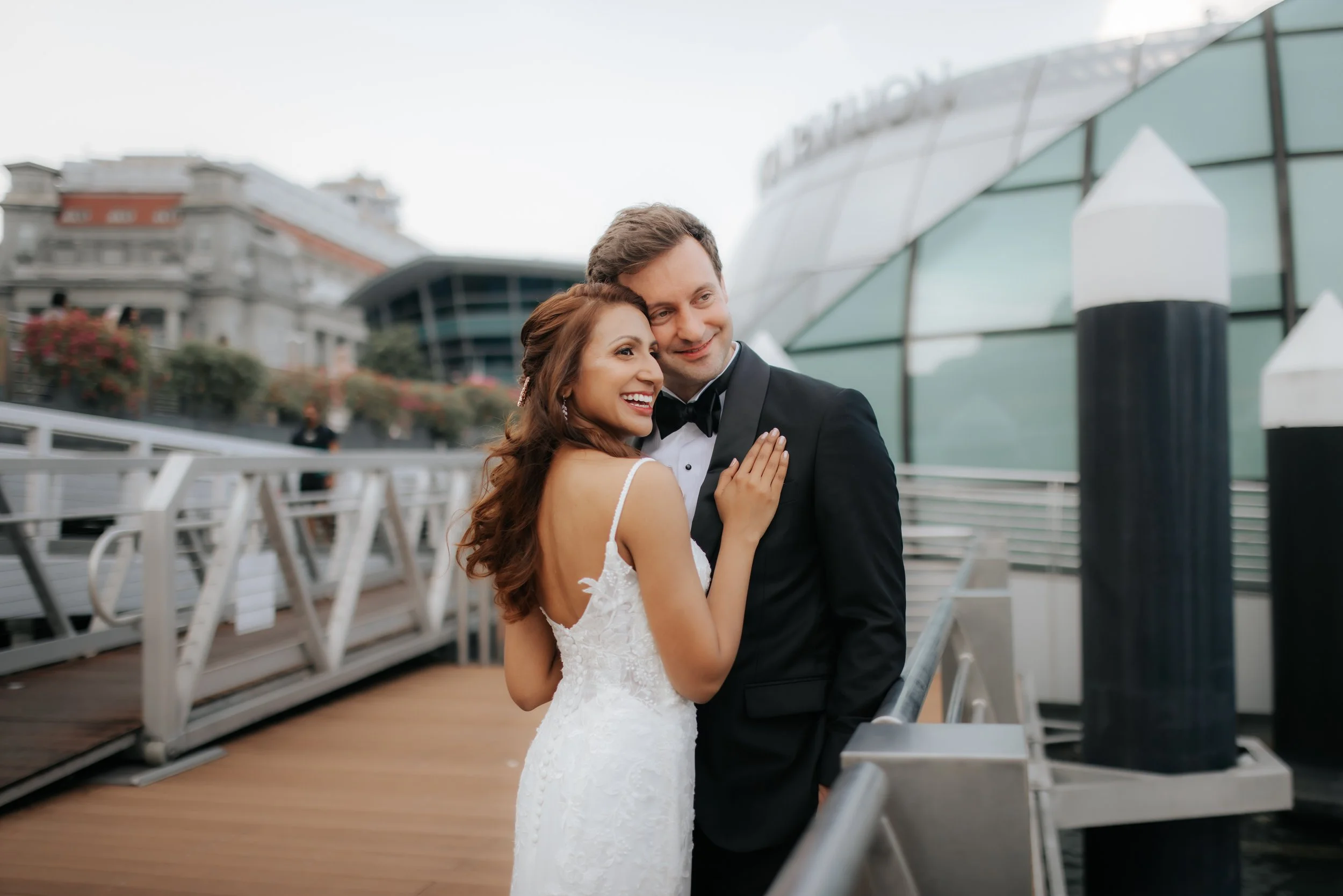 Light and airy actual day wedding photoshoot of the couple posing at Riviera, captured by Ash for Breadandbutterworks.