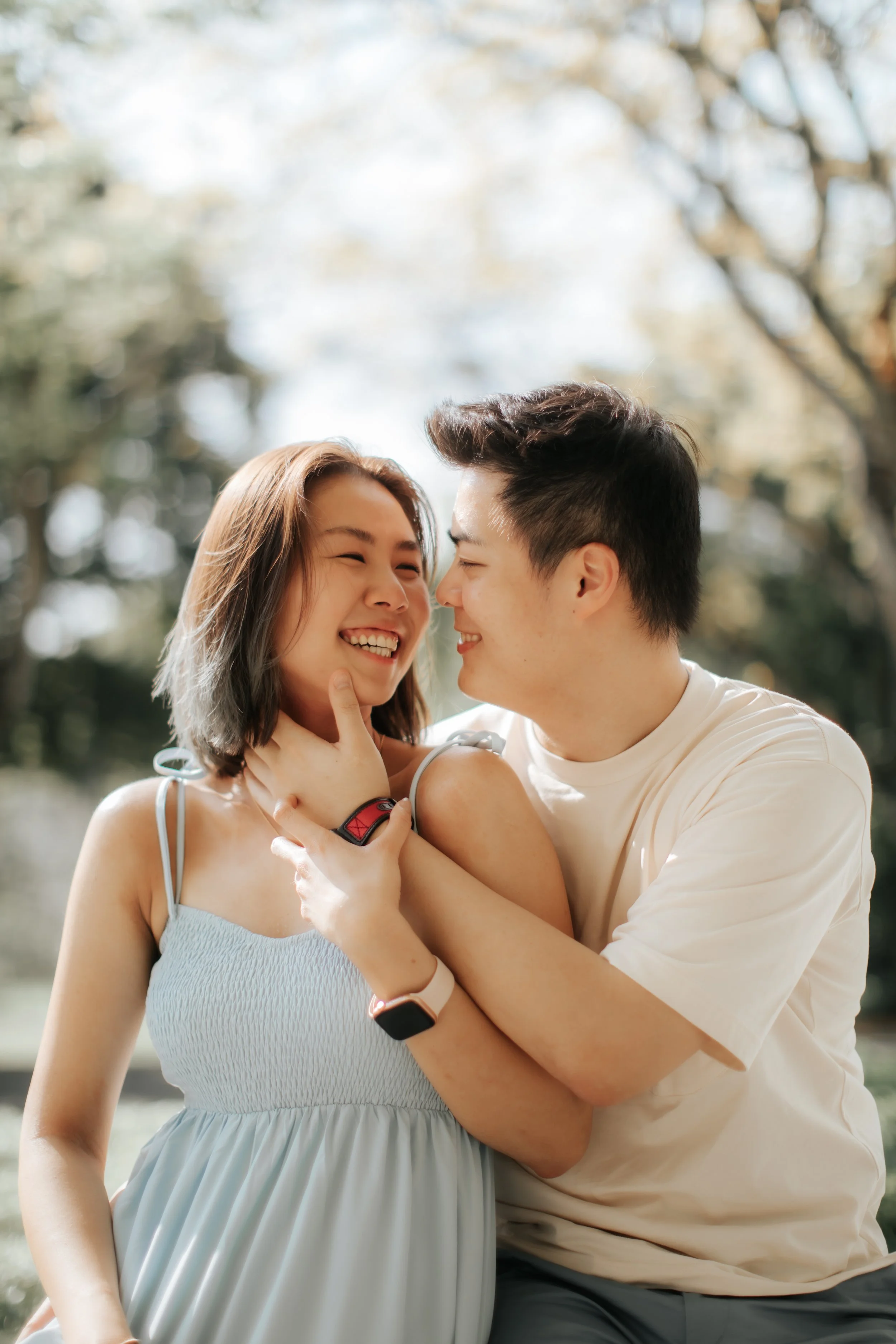 Light and airy family photoshoot in Singapore featuring a young couple, captured by Breadandbutterworks.