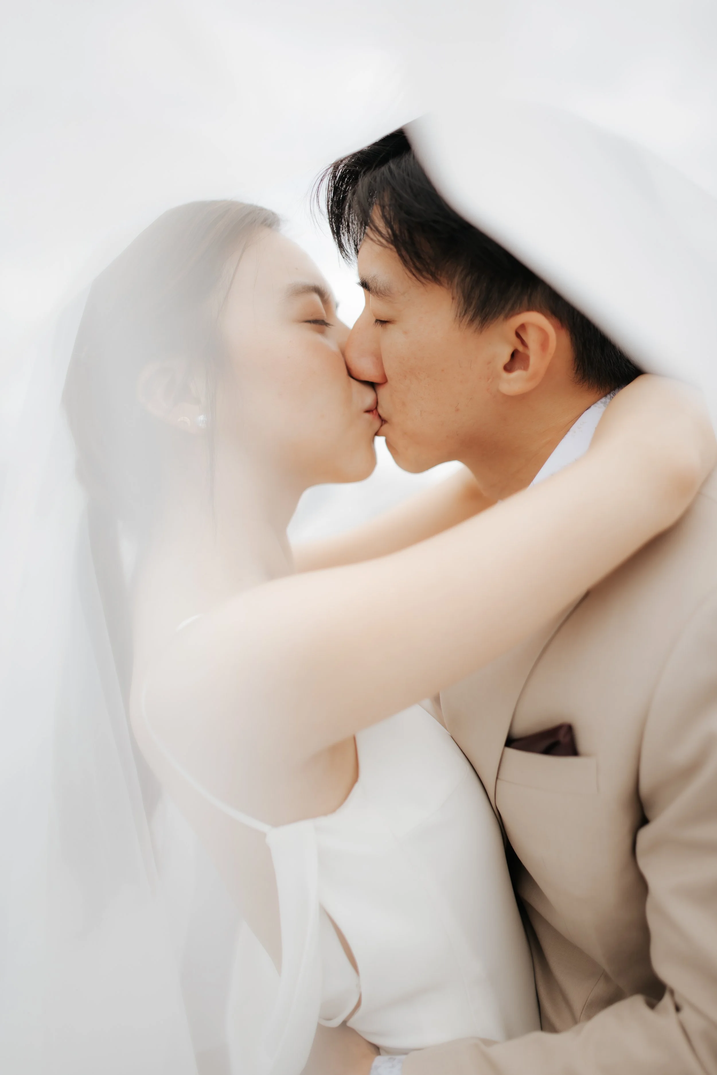 Light and airy pre-wedding photoshoot in the heartlands of Singapore, featuring a Stickies Bar. Captured by Ash for Breadandbutterworks.