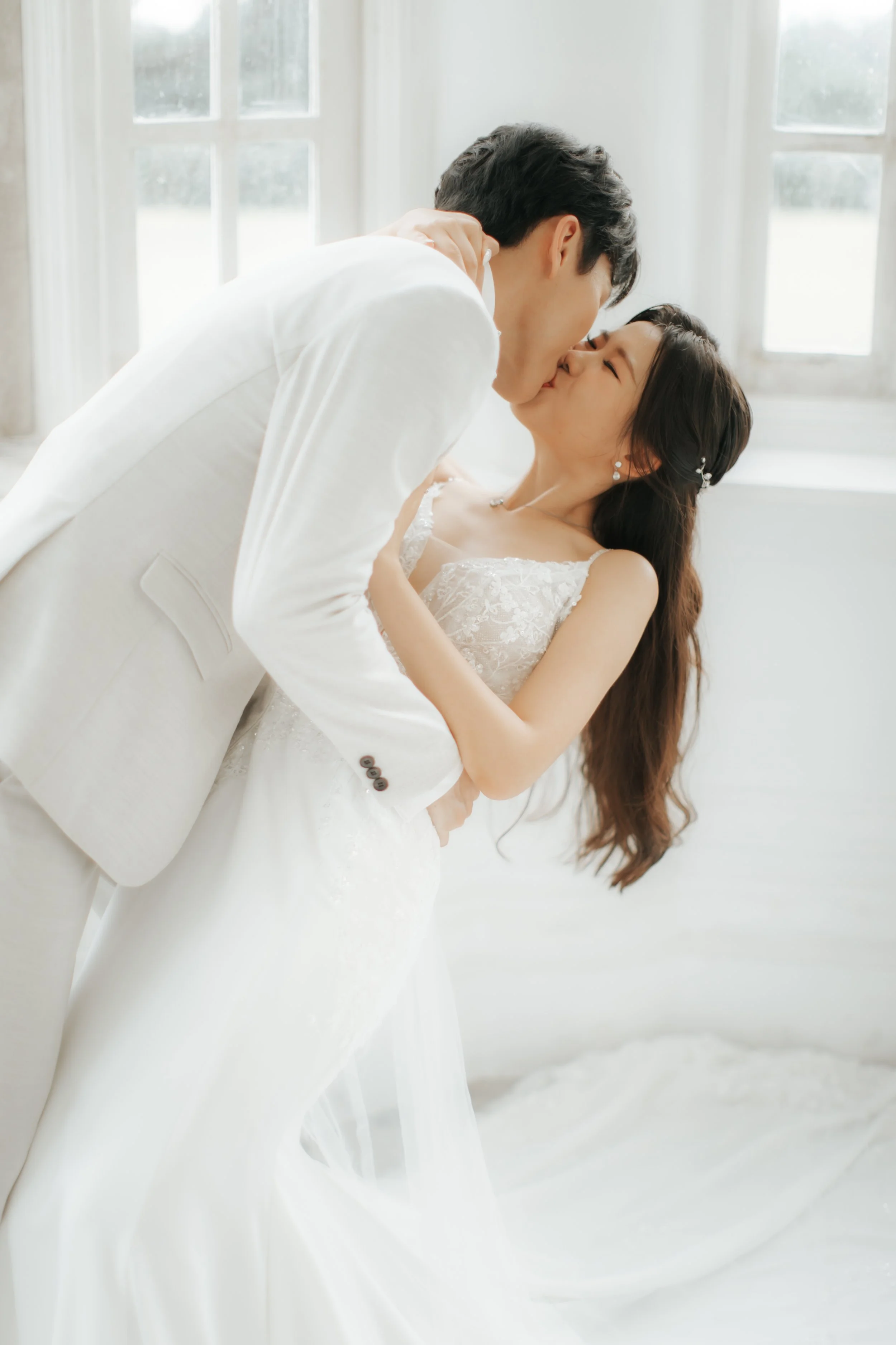 Light and airy pre-wedding photoshoot of a cheerful colour at Gallop Extension Singapore, captured by Arielle for Breadandbutterworks.