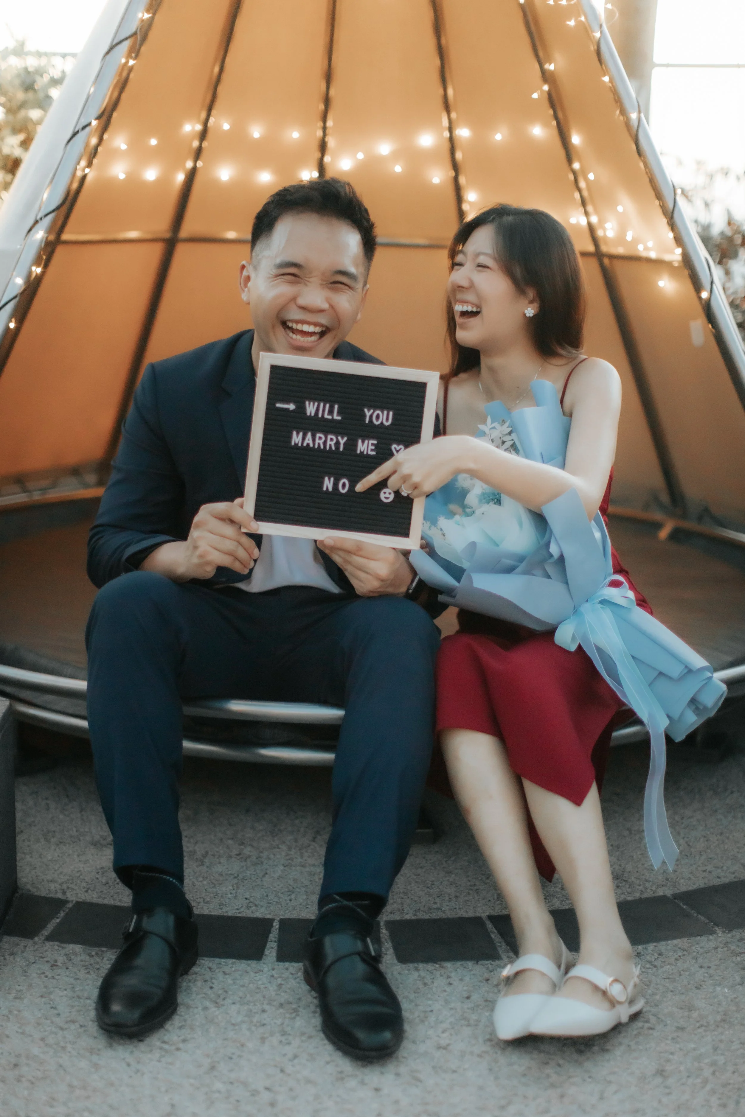 Funny and airy proposal photoshoot at Mr Stork at Andaz Singapore, captured by Arielle for Breadandbutterworks.