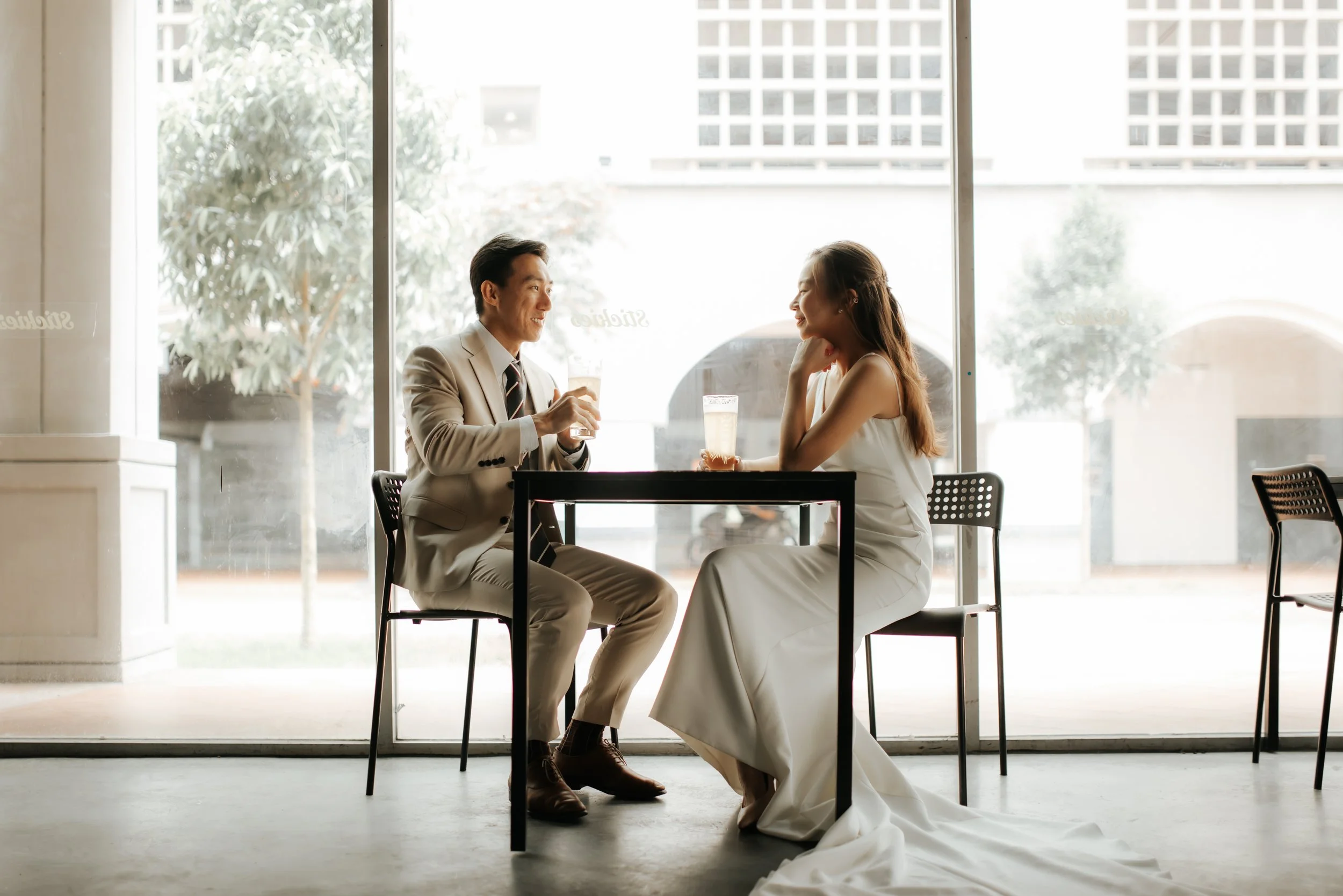 Light and airy pre-wedding photoshoot in the heartlands of Singapore, featuring a Stickies Bar. Captured by Ash for Breadandbutterworks.