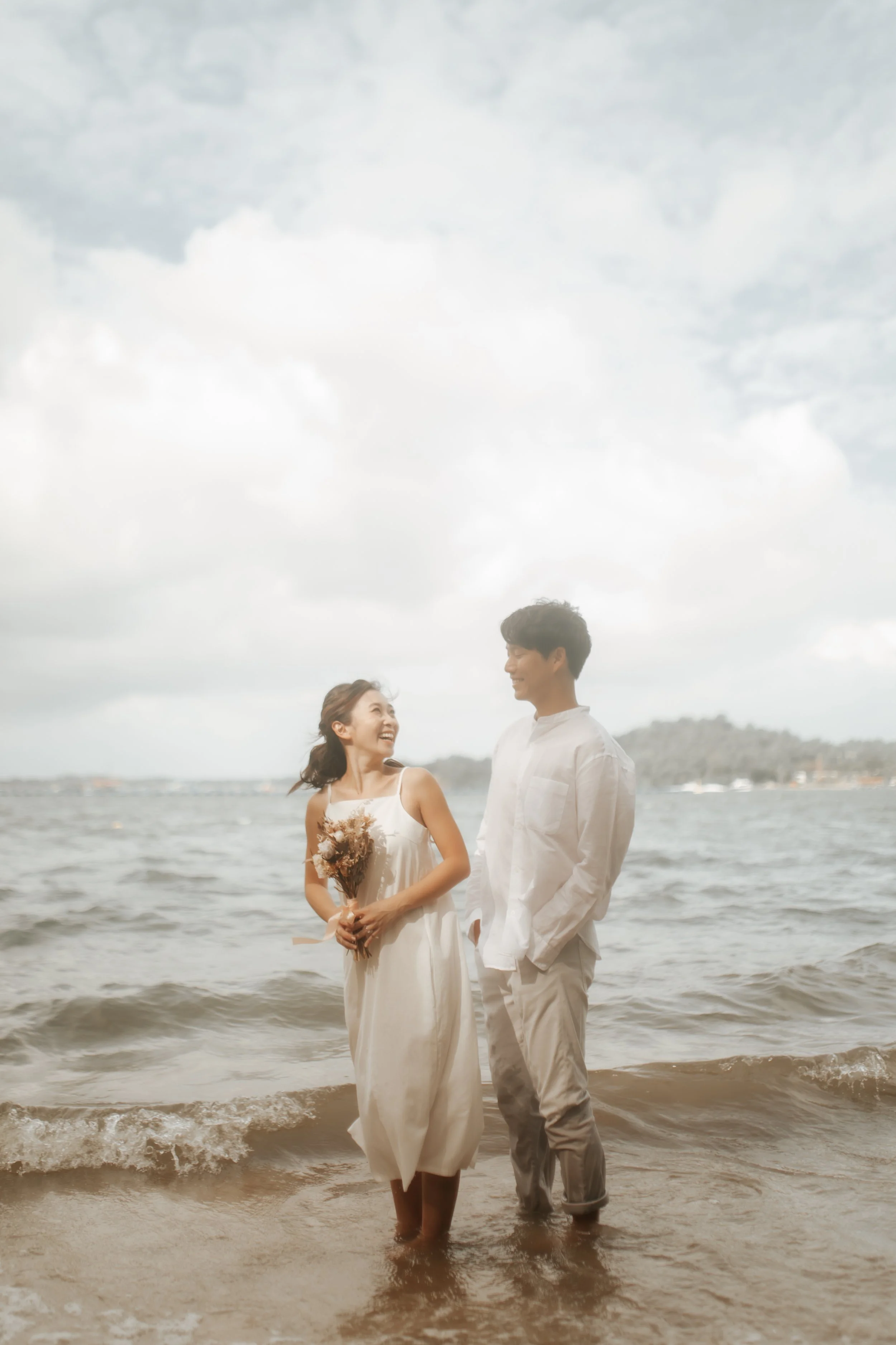 Relaxed and natural beach pre-wedding photoshoot at Punggol Beach in Singapore, captured by Arielle for Breadandbutterworks.