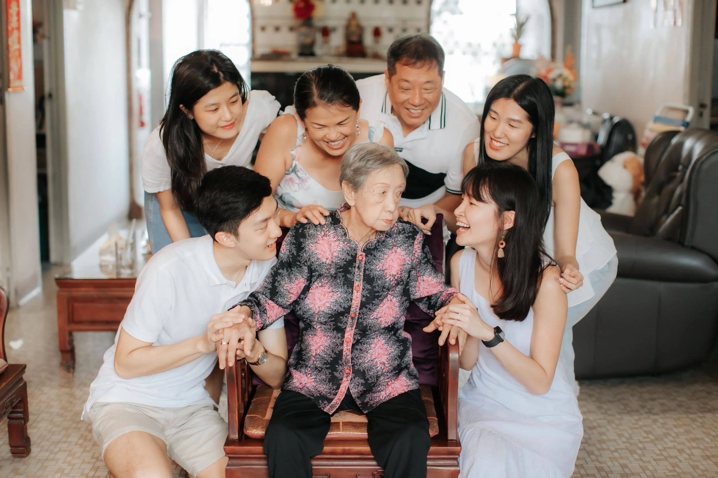 Heartwarming family photoshoot in Singapore featuring a multi-generational family, captured in a light and airy style by Arielle for Breadandbutterworks.