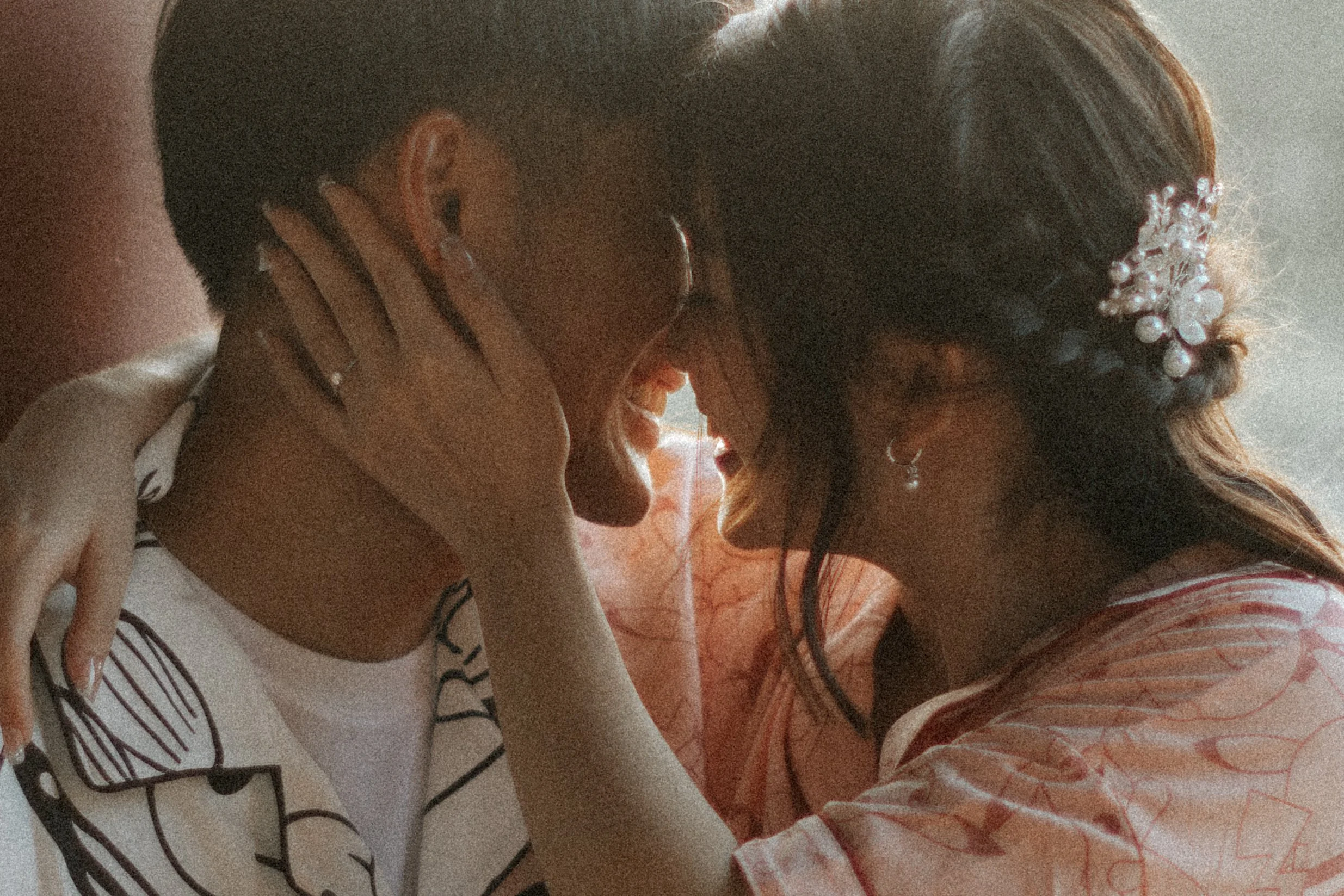Intimate pre-wedding photo of a couple sharing a quiet close-up moment, captured by Breadandbutterworks in a soft and heartfelt style.