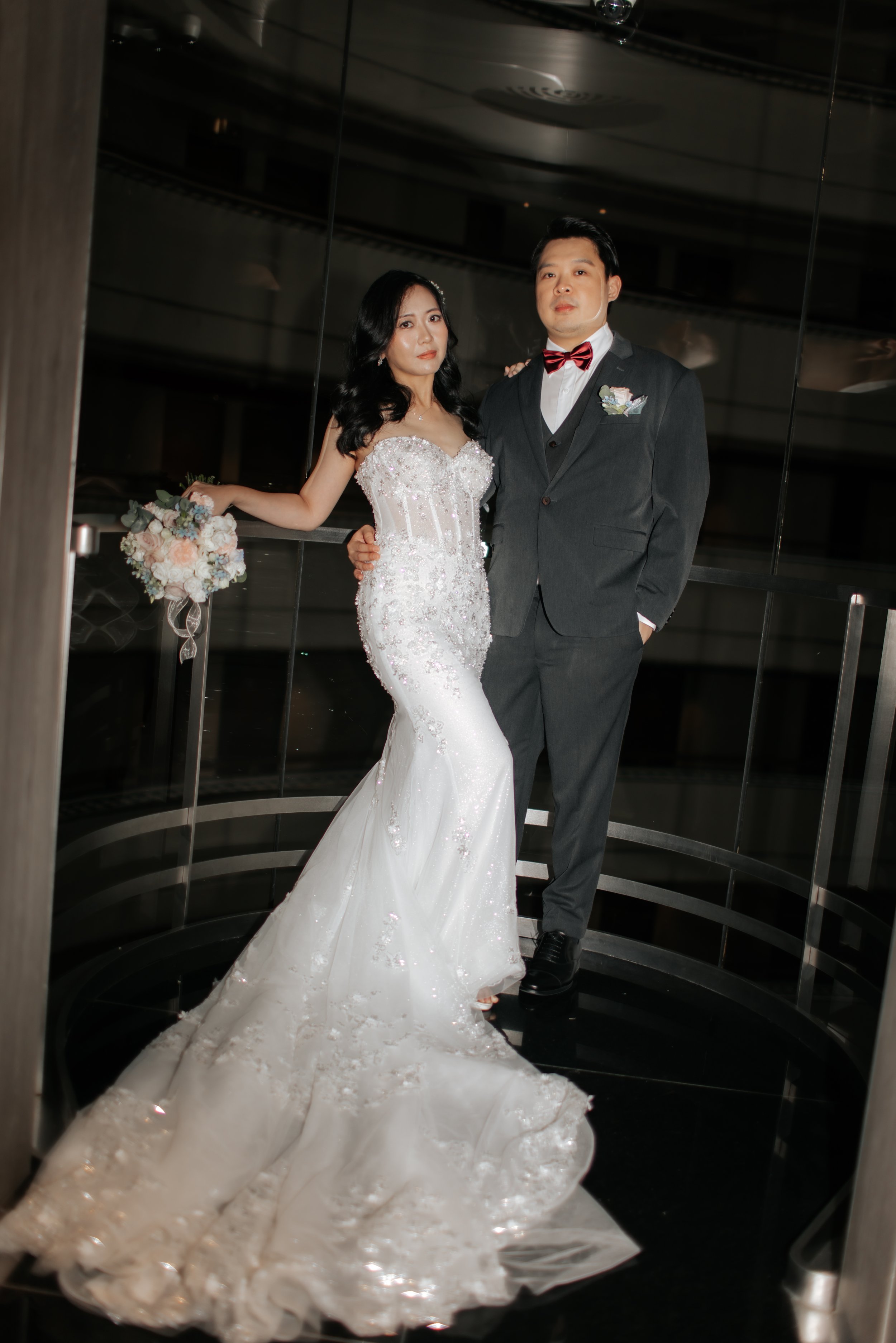 Editorial style actual day wedding photoshoot taken in the elevator of Holiday Inn. Captured by Arielle for Breadandbutterworks. 