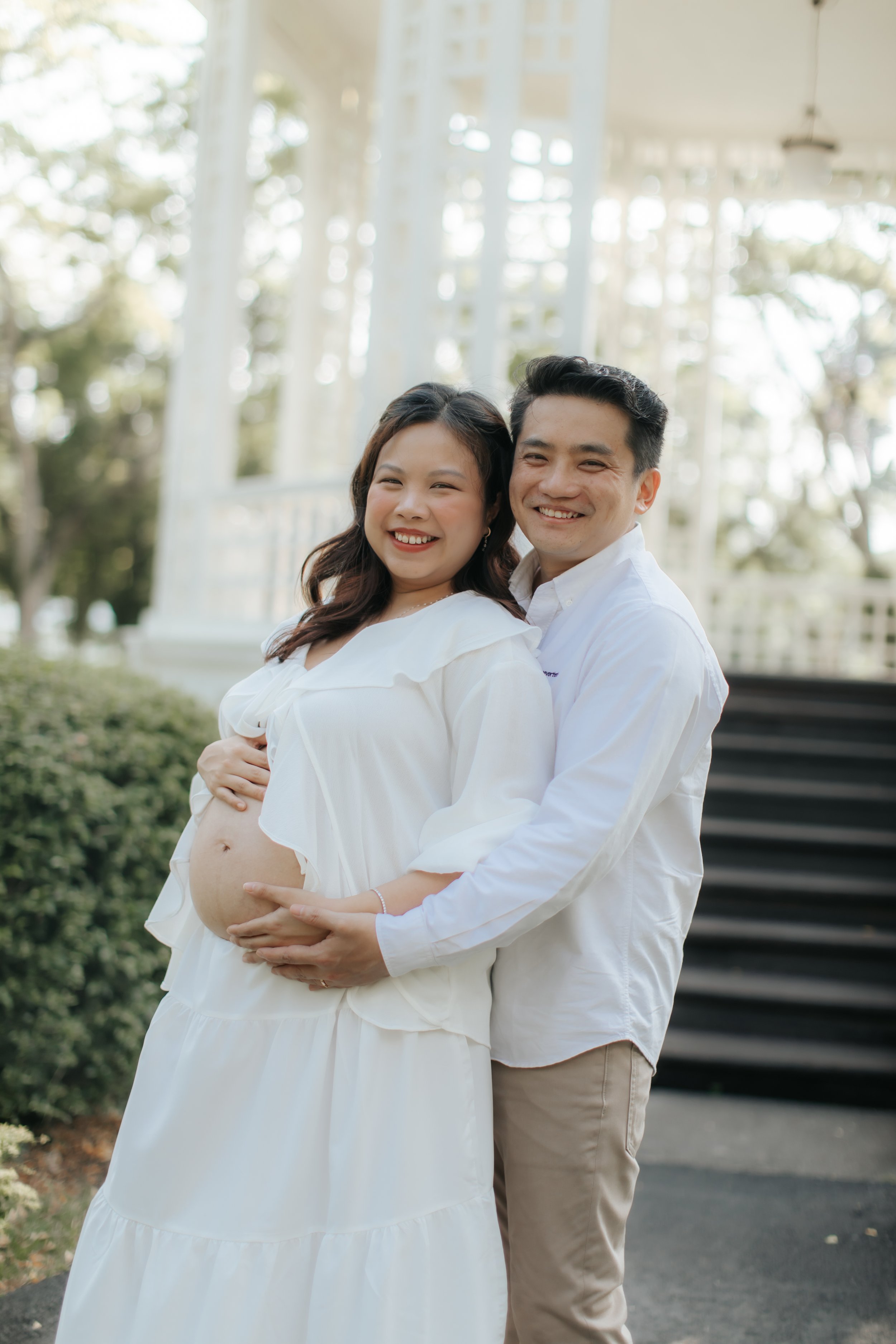 Light and airy maternity shoot at bandstand, captured by Arielle for Breadandbutterworks.