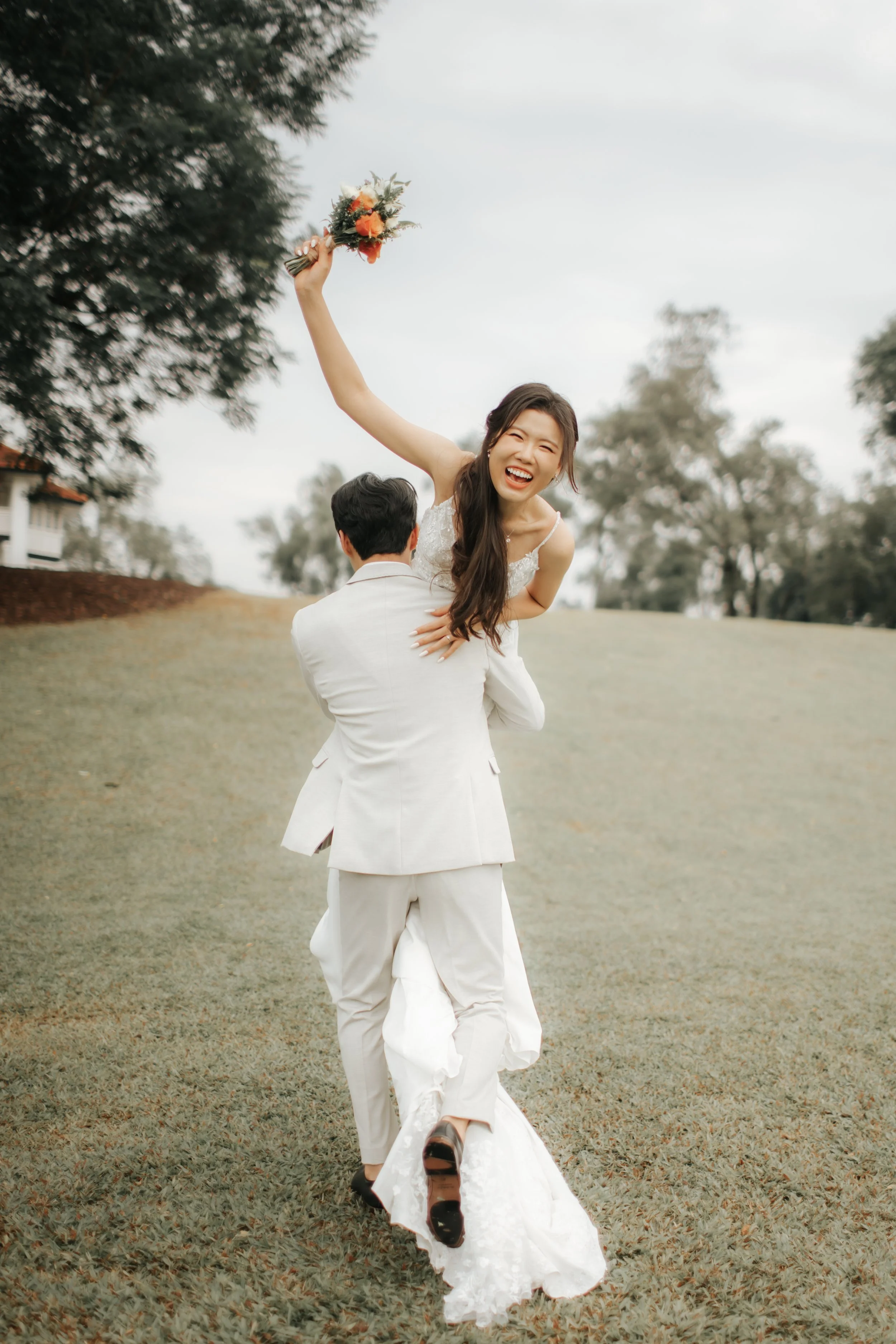Light and airy pre-wedding photoshoot of a cheerful colour at Gallop Extension Singapore, captured by Arielle for Breadandbutterworks.