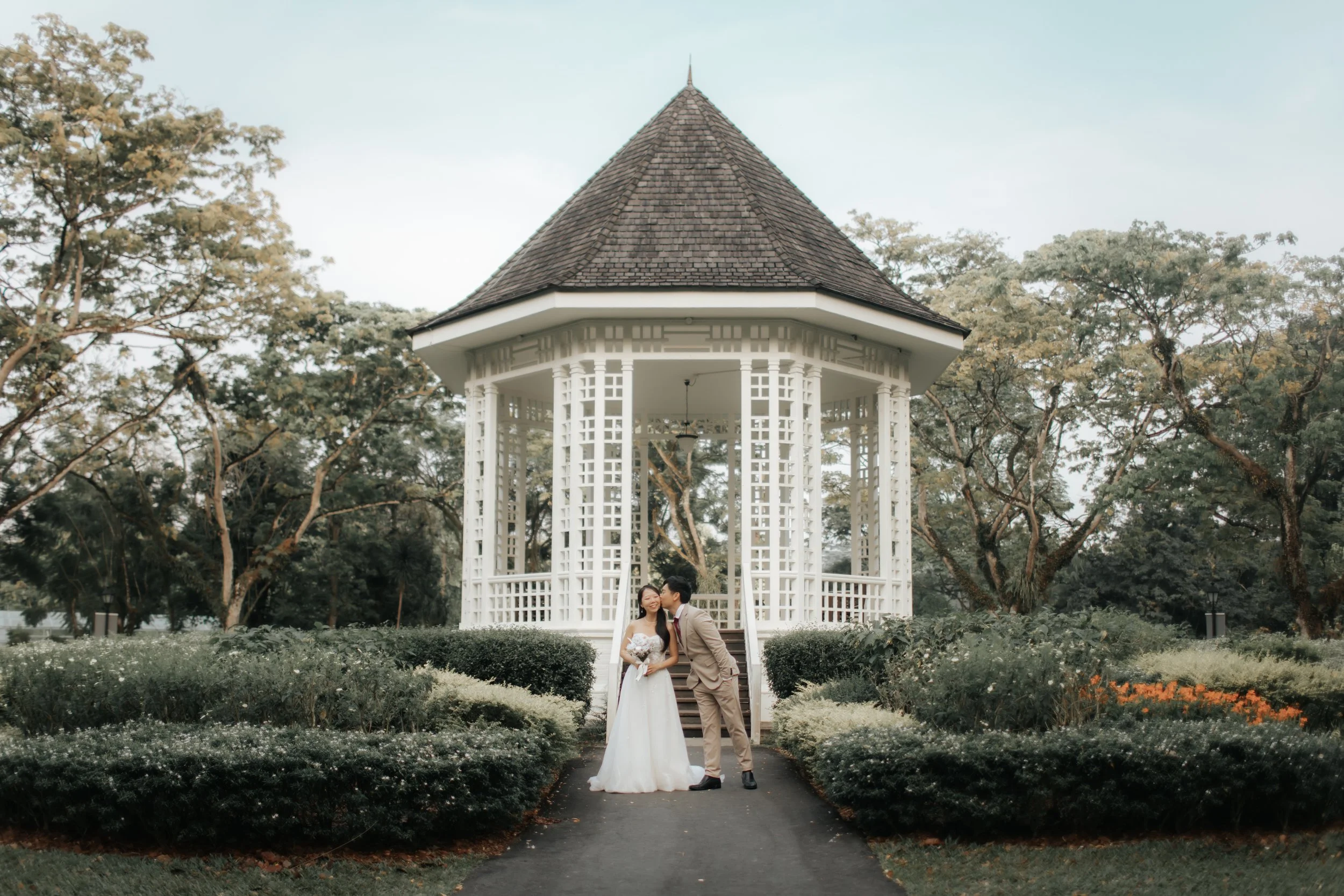 Light and airy pre-wedding photoshoot of a couple at Bandstand and Gallop Extension in Singapore. Captured by Arielle from Breadandbutterworks.