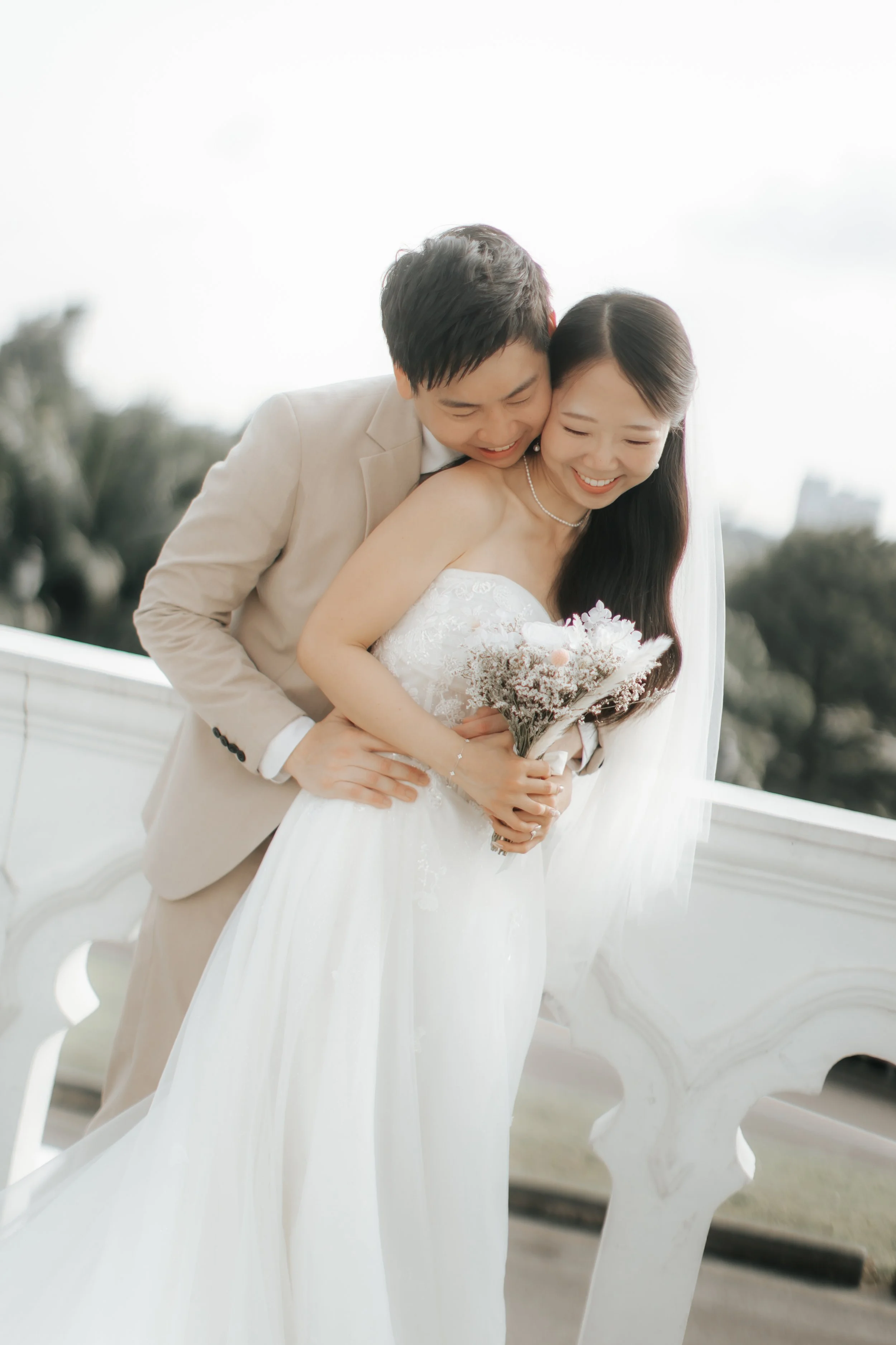 Light and airy pre-wedding photoshoot of a couple at Bandstand and Gallop Extension in Singapore. Captured by Arielle from Breadandbutterworks.