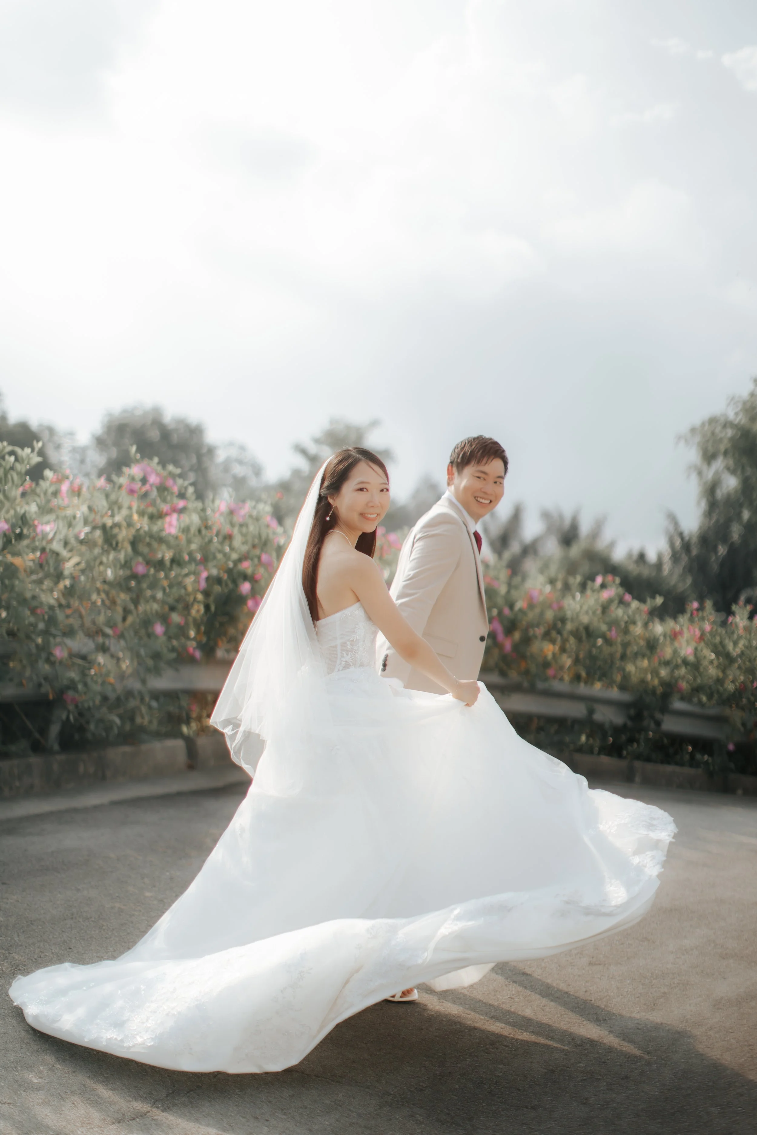 Light and airy pre-wedding photoshoot of a couple at Bandstand and Gallop Extension in Singapore. Captured by Arielle from Breadandbutterworks.