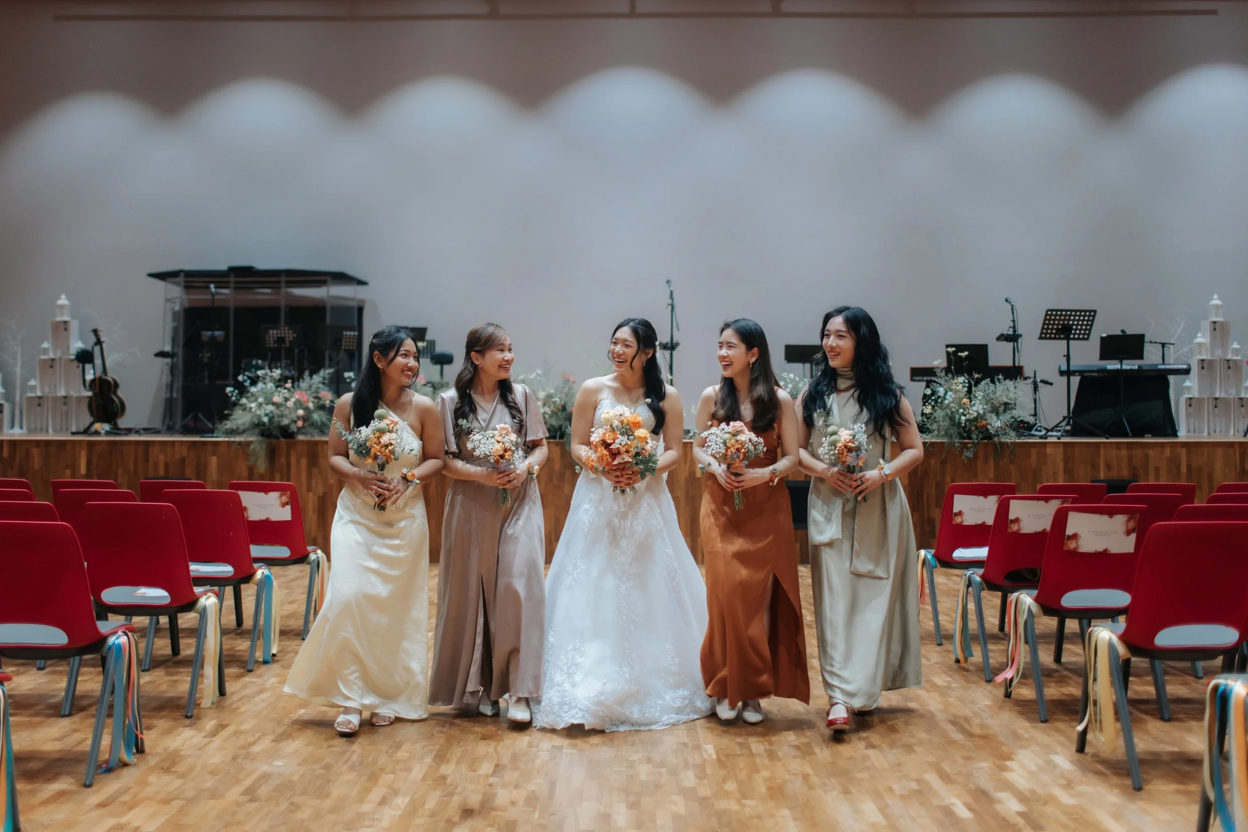 Actual day wedding shoot of the bride and her bridal party at Adam Road Presbyterian Church in Singapore. Captured in a light and airy style by Arielle for Breadandbutterworks.