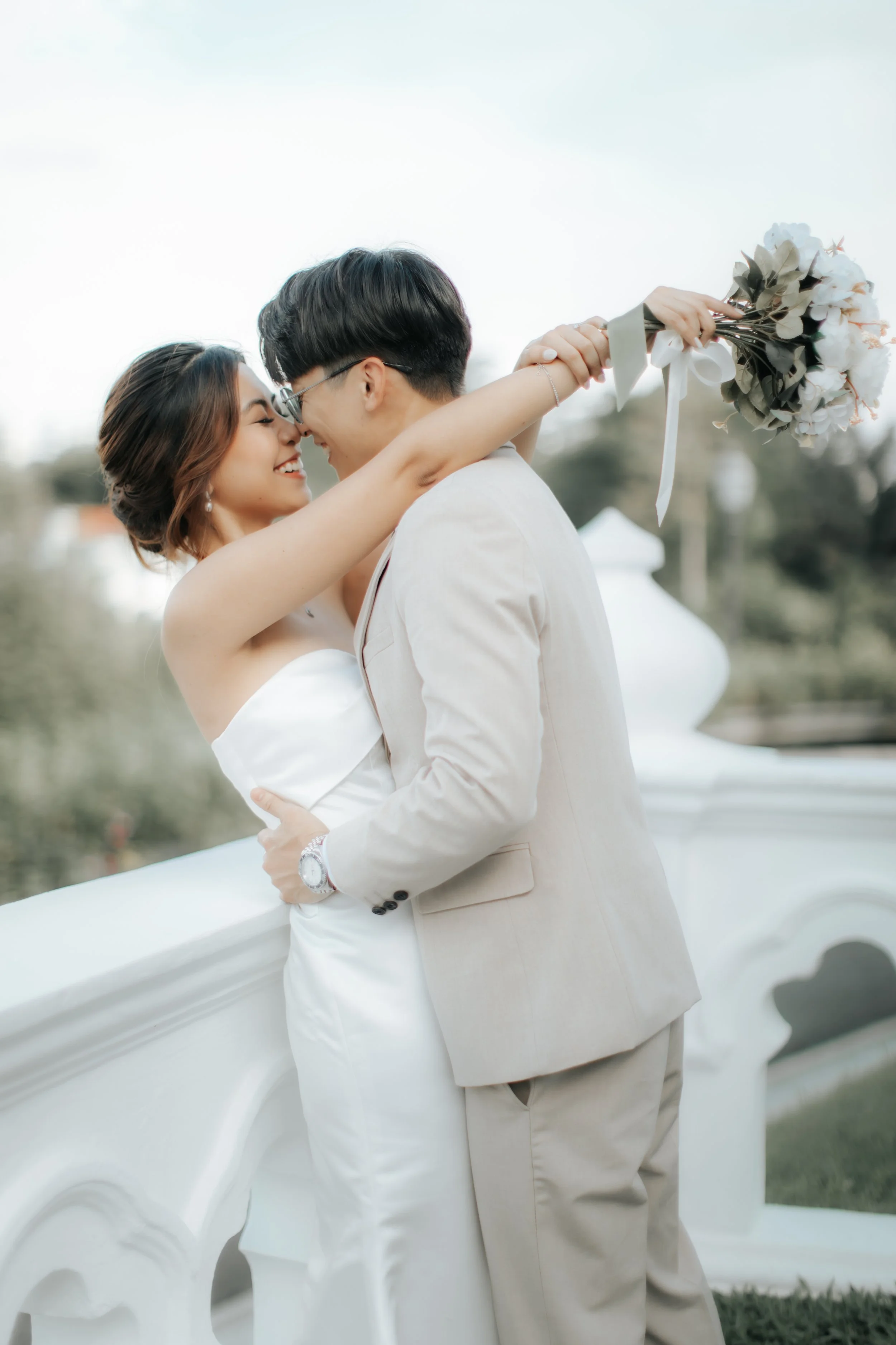 Gorgeous bride and groom pre-wedding photoshoot at Canterbury Road in Singapore. Captured in a light and airy style by Arielle for Breadandbutterworks.