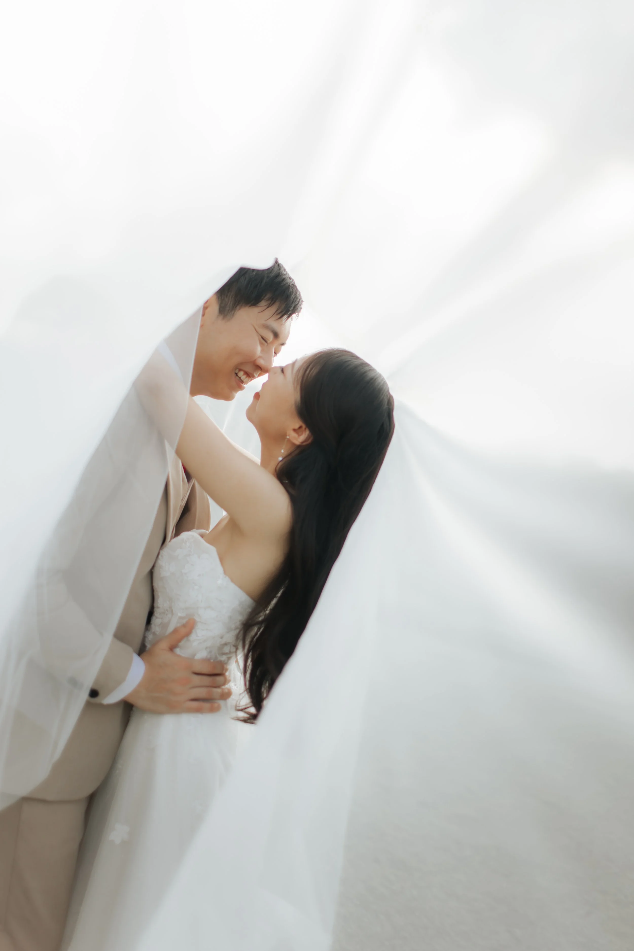 Light and airy artistic pre-wedding photoshoot of a couple at Bandstand and Gallop Extension in Singapore. Captured by Arielle from Breadandbutterworks.