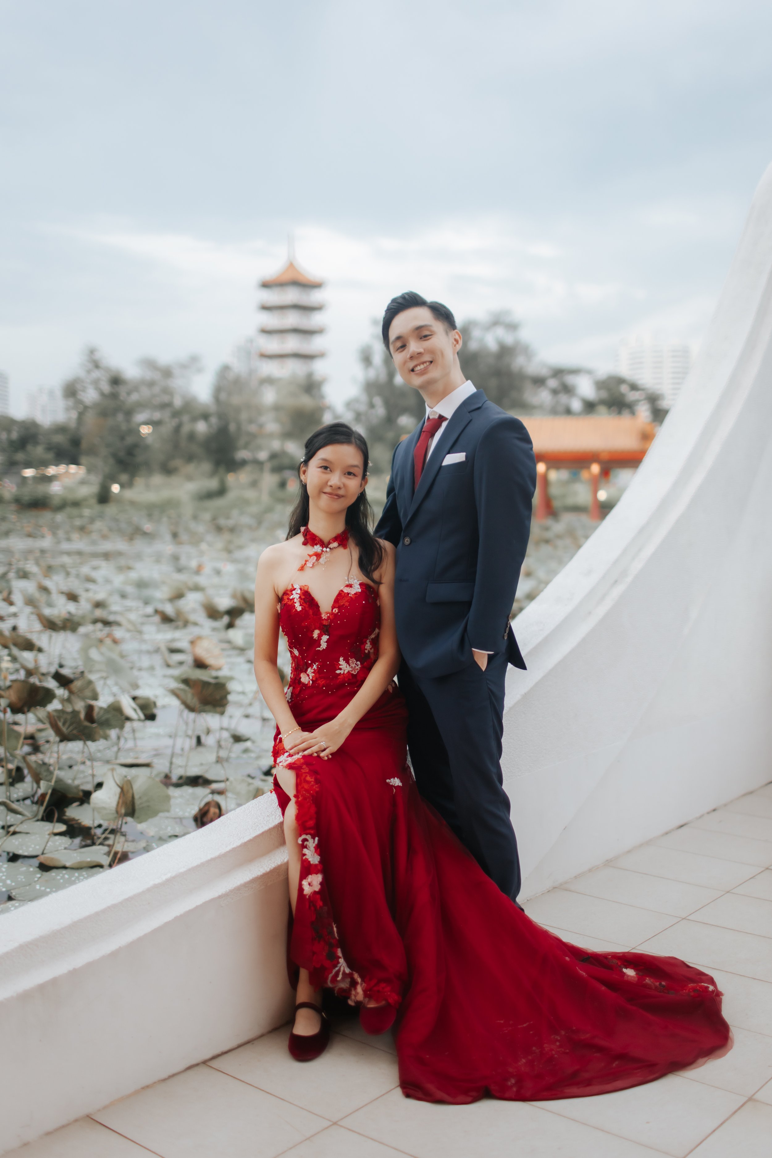 Pre-wedding photoshoot at Chinese Gardens with traditional cheongsam, captured by Breadandbutterworks