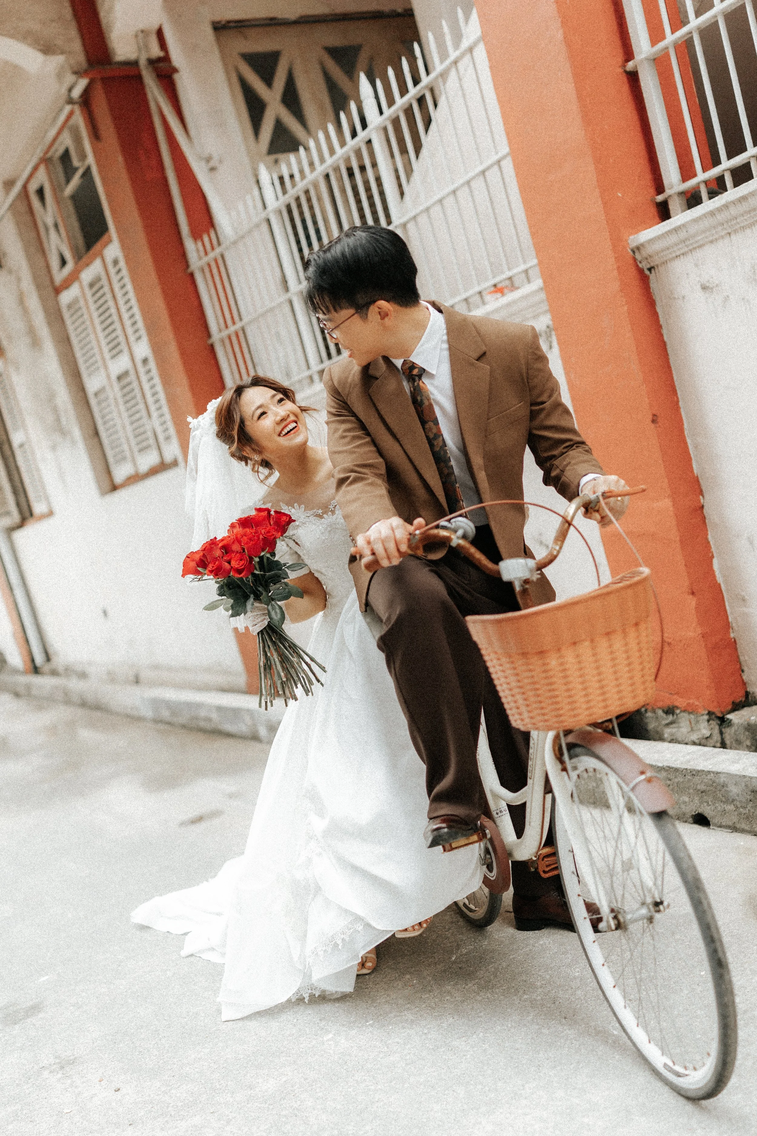 Vintage pre-wedding photoshoot in a Wong Kar Wai style, captured in the Singapore heartlands by Ash for Breadandbutterworks.