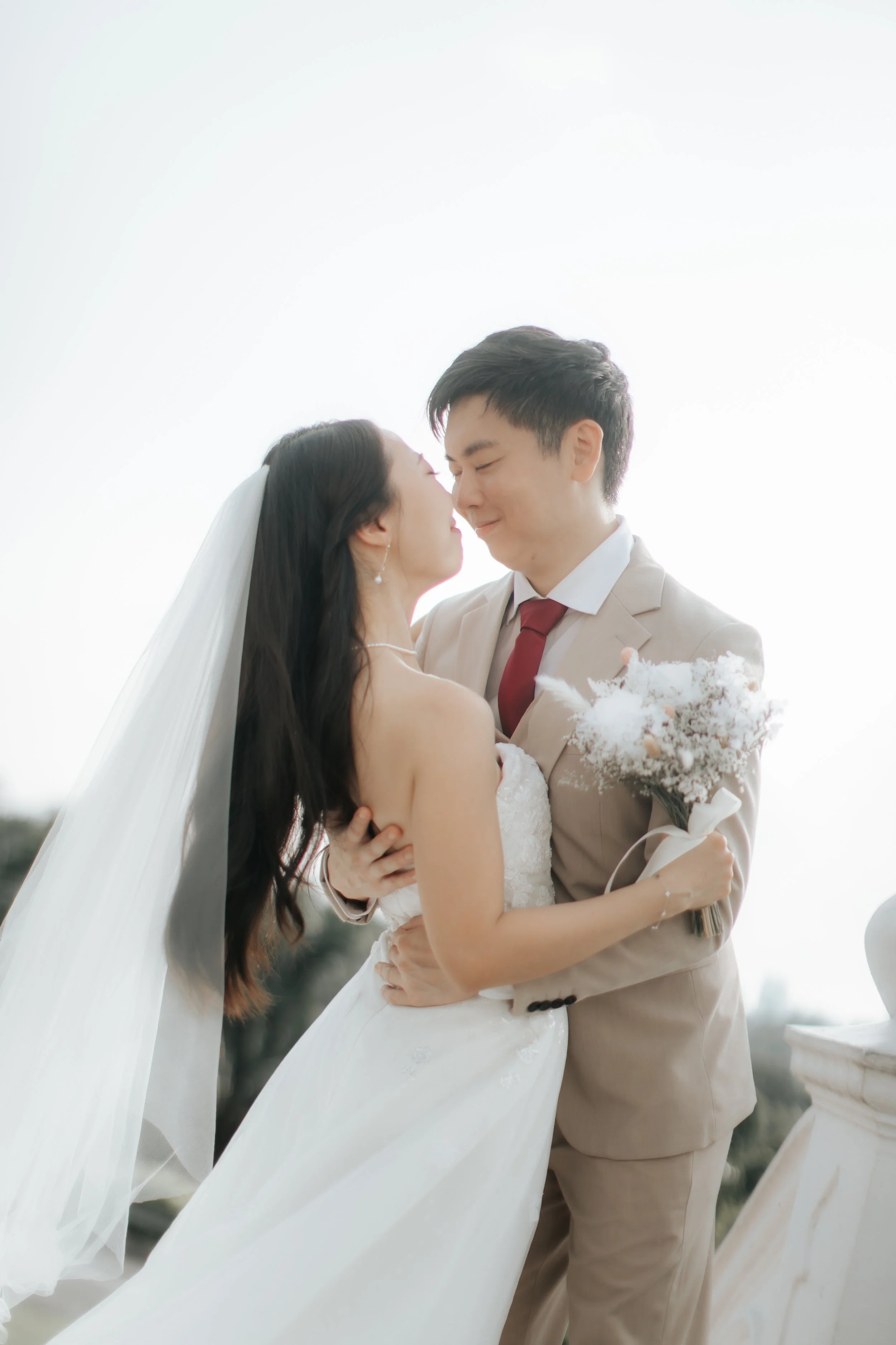 Light and airy pre-wedding photoshoot of a couple at Bandstand and Gallop Extension in Singapore. Captured by Arielle from Breadandbutterworks.