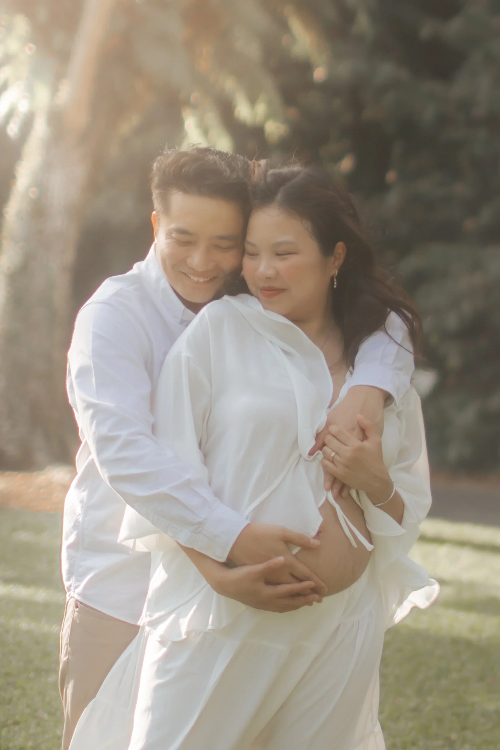 Light and airy maternity shoot at bandstand, captured by Arielle for Breadandbutterworks.