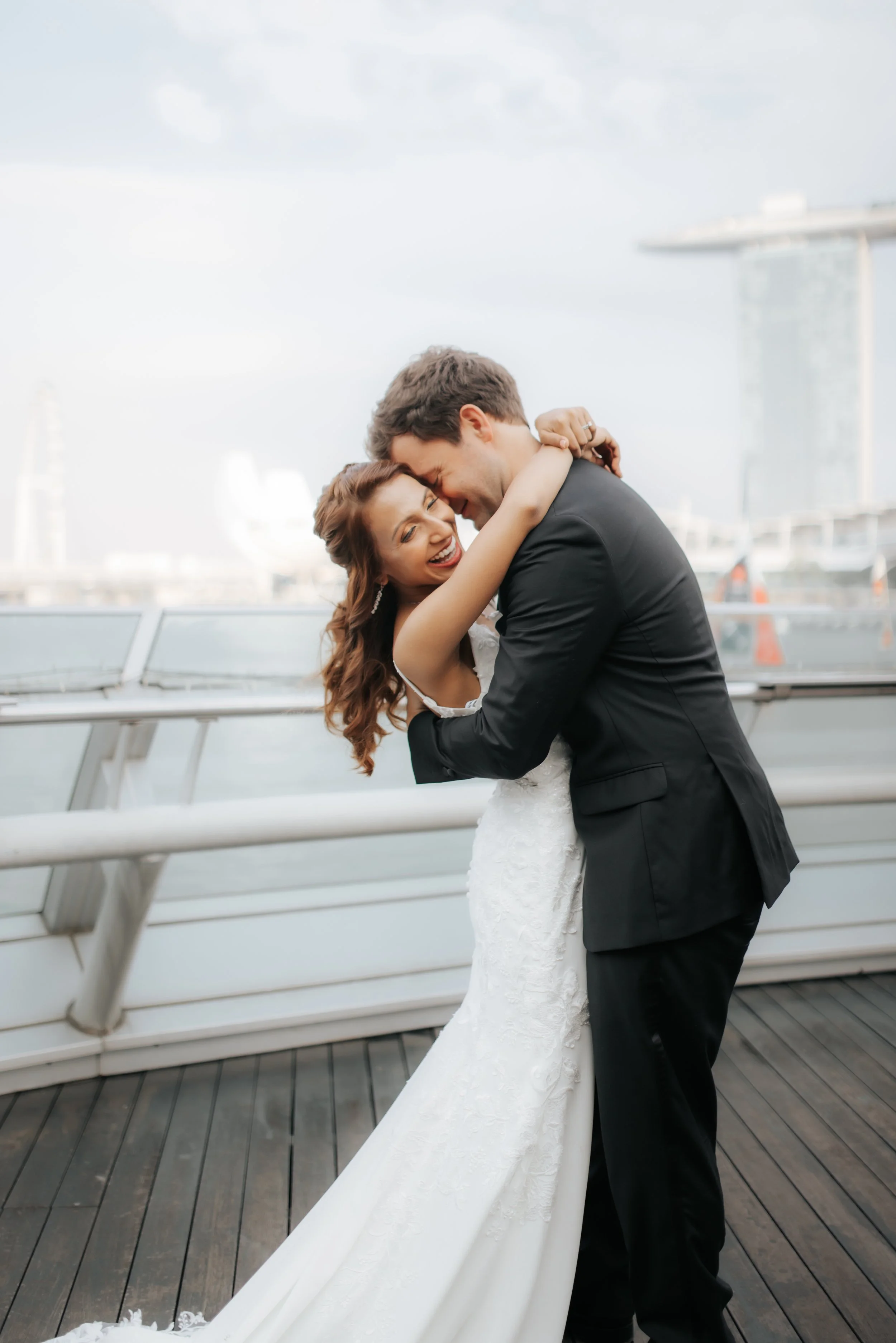 Light and airy actual day wedding photoshoot of the couple posing at Riviera, captured by Ash for Breadandbutterworks.