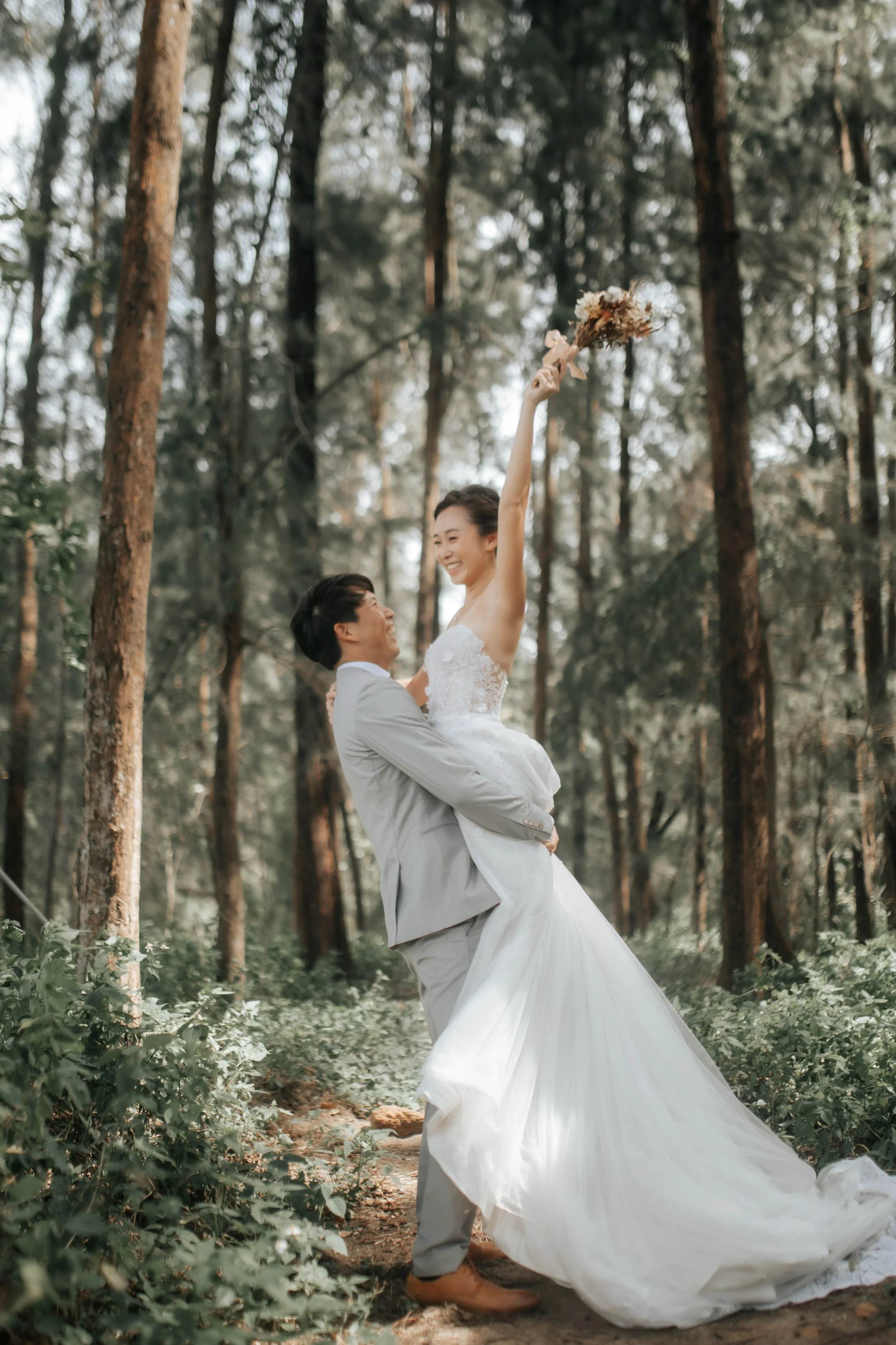 Relaxed and natural outdoor pre-wedding photoshoot at Coney Island Singapore, captured by Arielle for Breadandbutterworks.