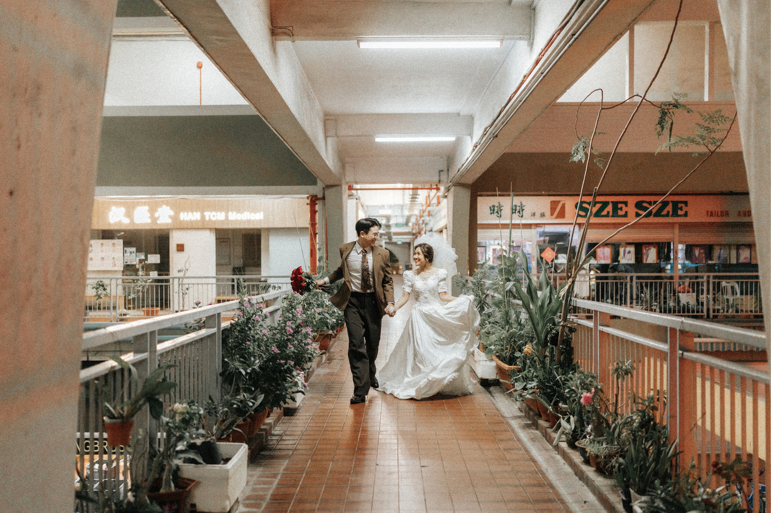 Vintage pre-wedding photoshoot in a Wong Kar Wai style, captured in the Singapore heartlands by Ash for Breadandbutterworks.