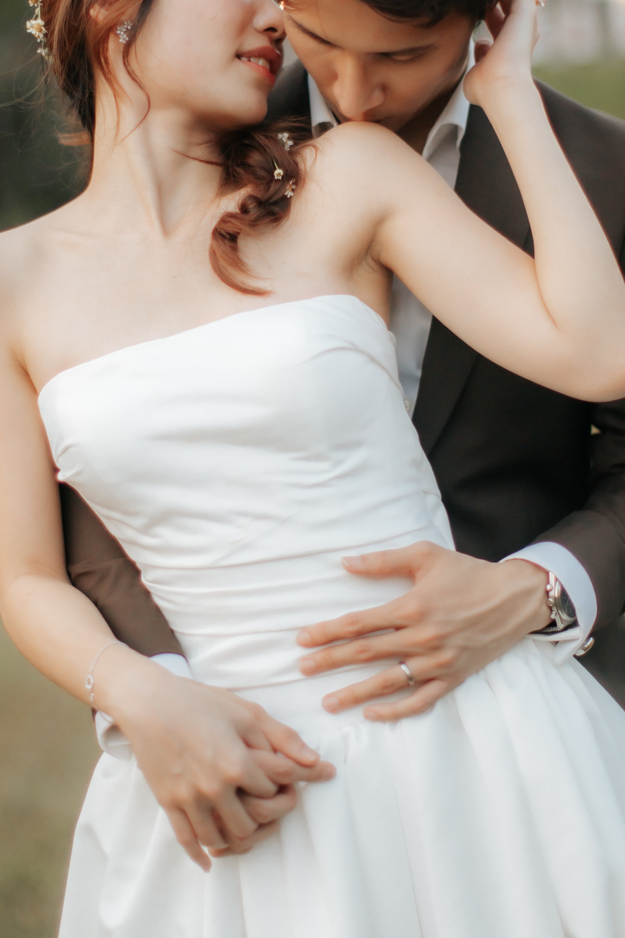 Romantic and dynamic pre-wedding photoshoot at Canterbury Hill. This shot features a more creative angle and cropping of the couple. Captured in a light and airy style by Arielle from Breadandbutterworks.