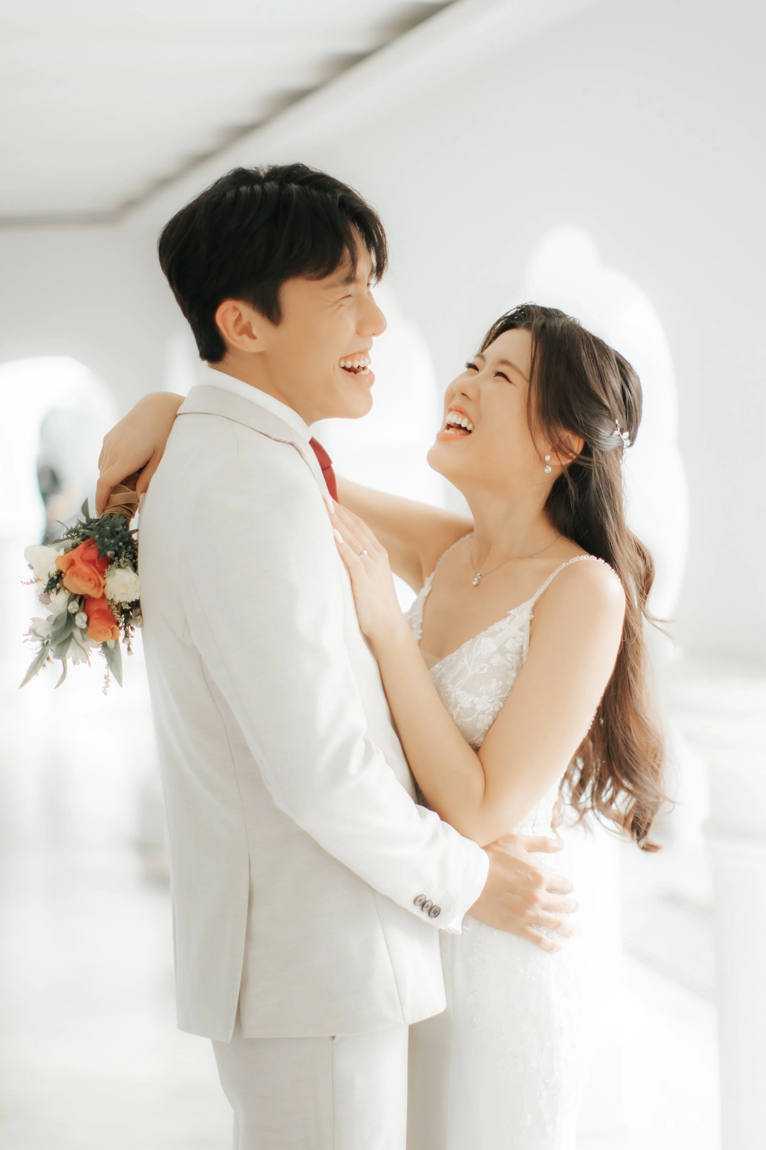 Light and airy pre-wedding photoshoot of a cheerful colour at Gallop Extension Singapore, captured by Arielle for Breadandbutterworks.