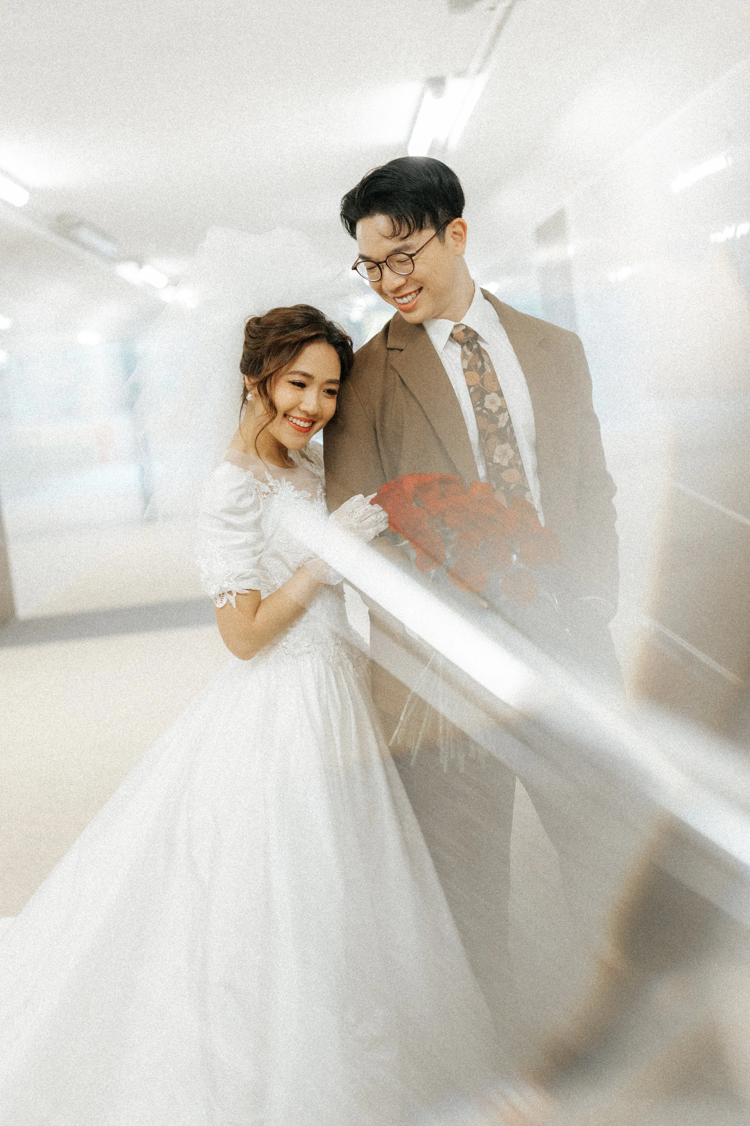 Vintage pre-wedding photoshoot in a Wong Kar Wai style, captured in the Singapore heartlands by Ash for Breadandbutterworks.